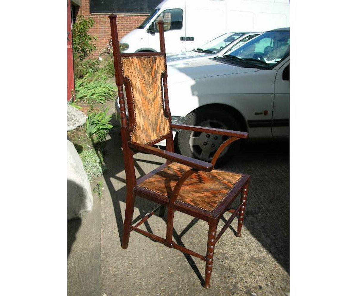 Mahogany Liberty and Co Attributed. A late Aesthetic Movement Walnut Armchair. For Sale