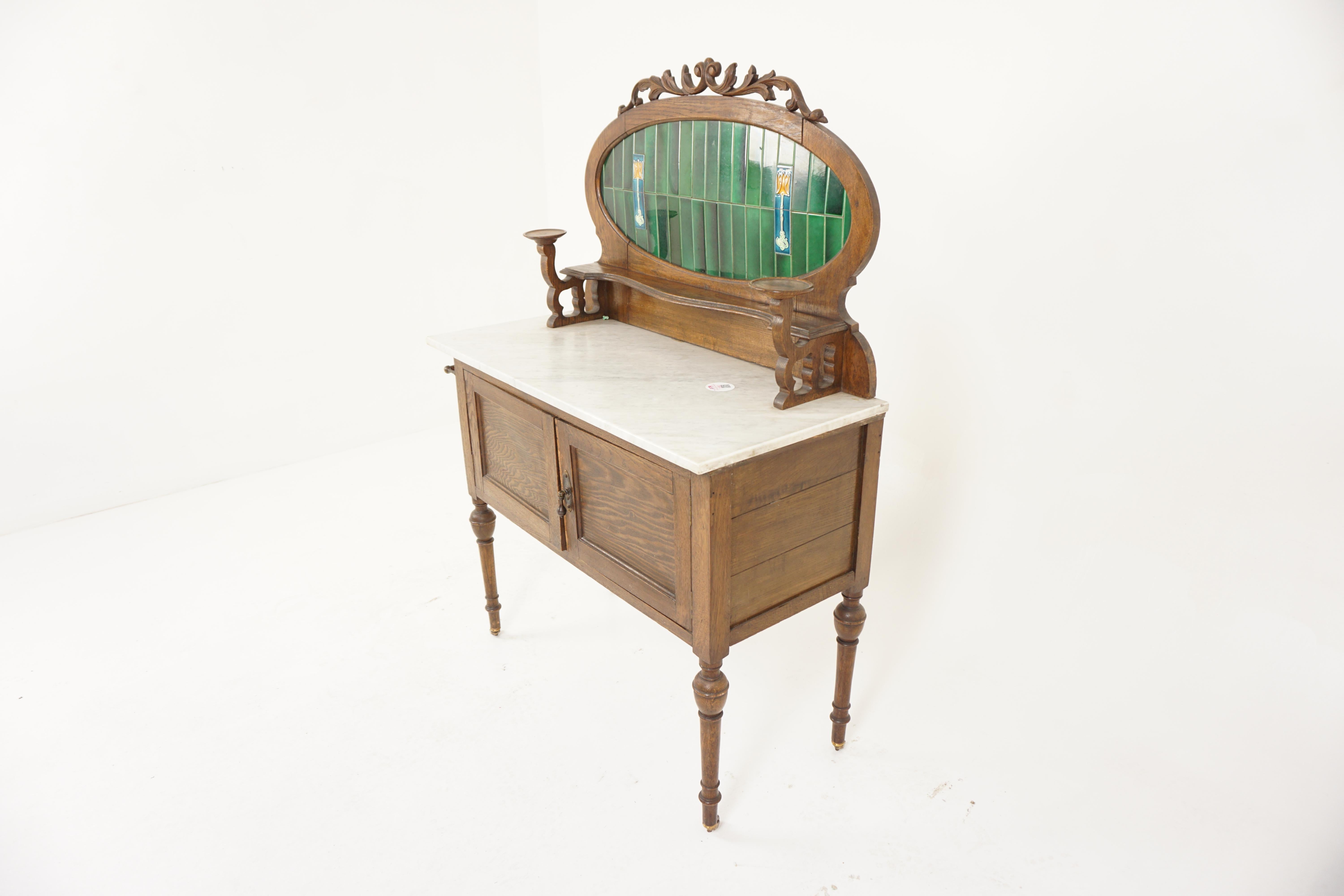 Arts and Crafts marble top washstand, dry sink, Scotland 1910, H887

Scotland 1910
Solid Oak
Original Finish
Ornate carving to the top of the oval shape green tiled backsplash
Shaped shelf below
Flanked by a pair of raised candle stick