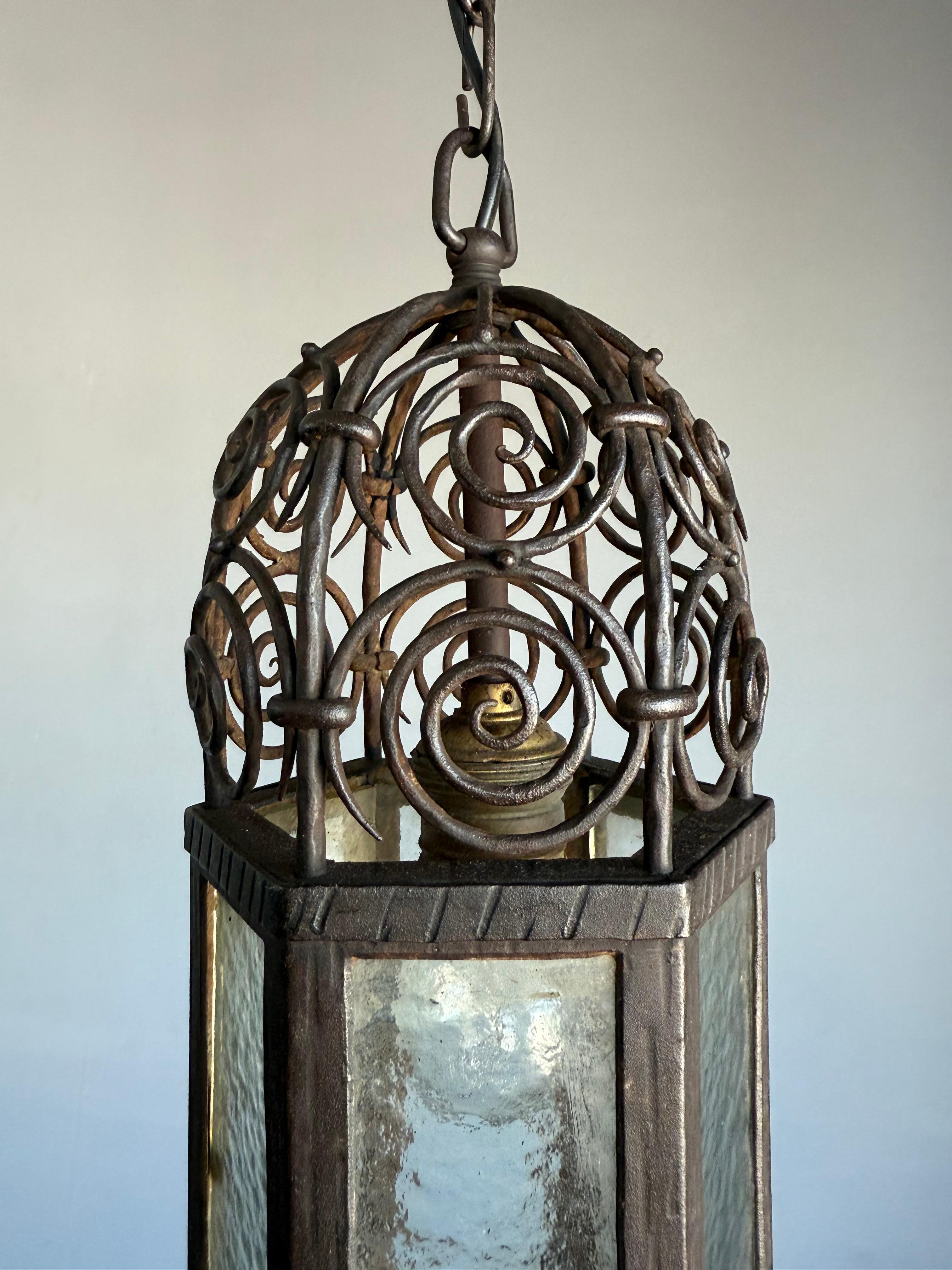 20th Century Arts and Crafts, Moorish Inspired Wrought Iron Lantern with Ornate Openwork Top For Sale