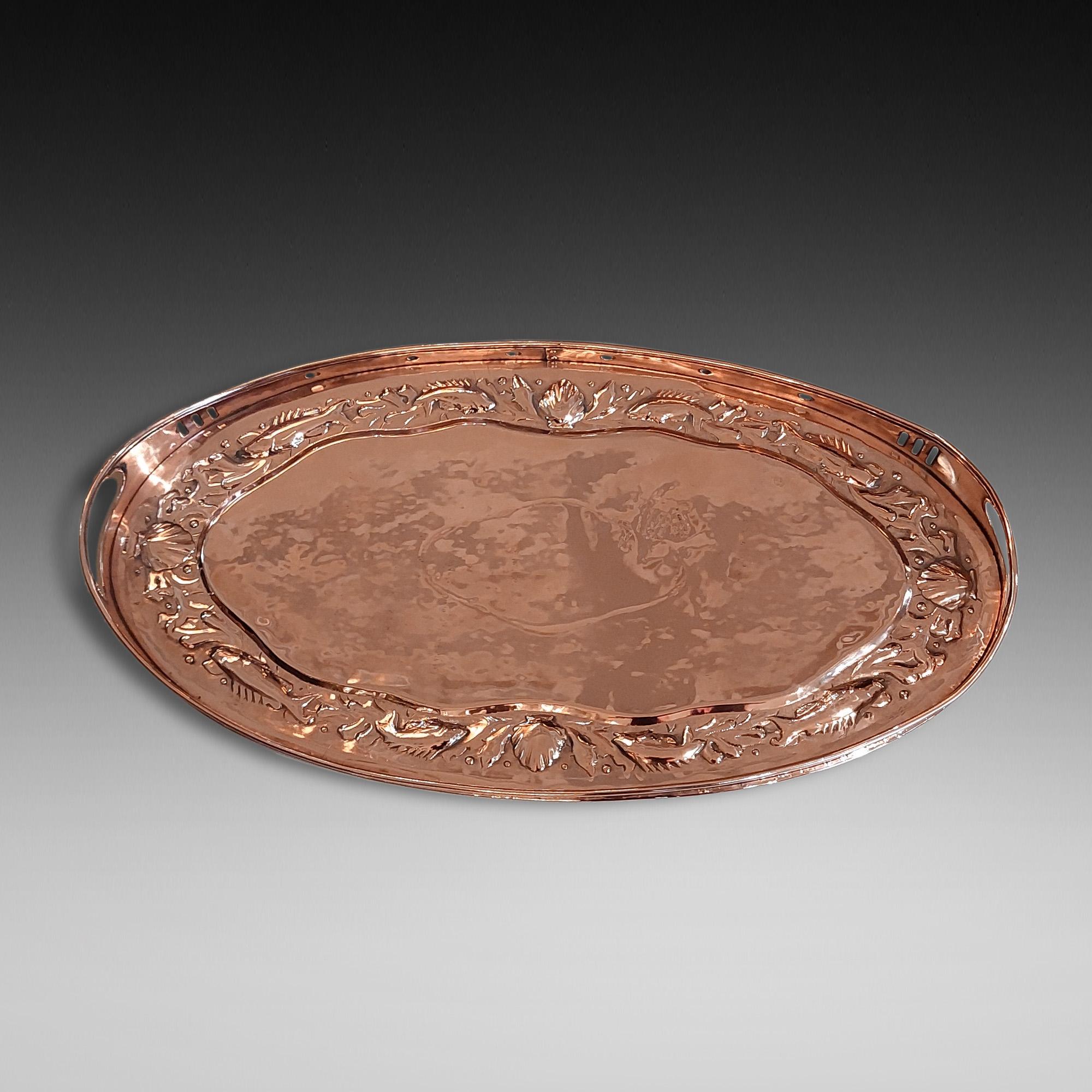 Arts and Crafts Newlyn Copper Oval Embossed Tray - embossed with fish and shellfish - 19