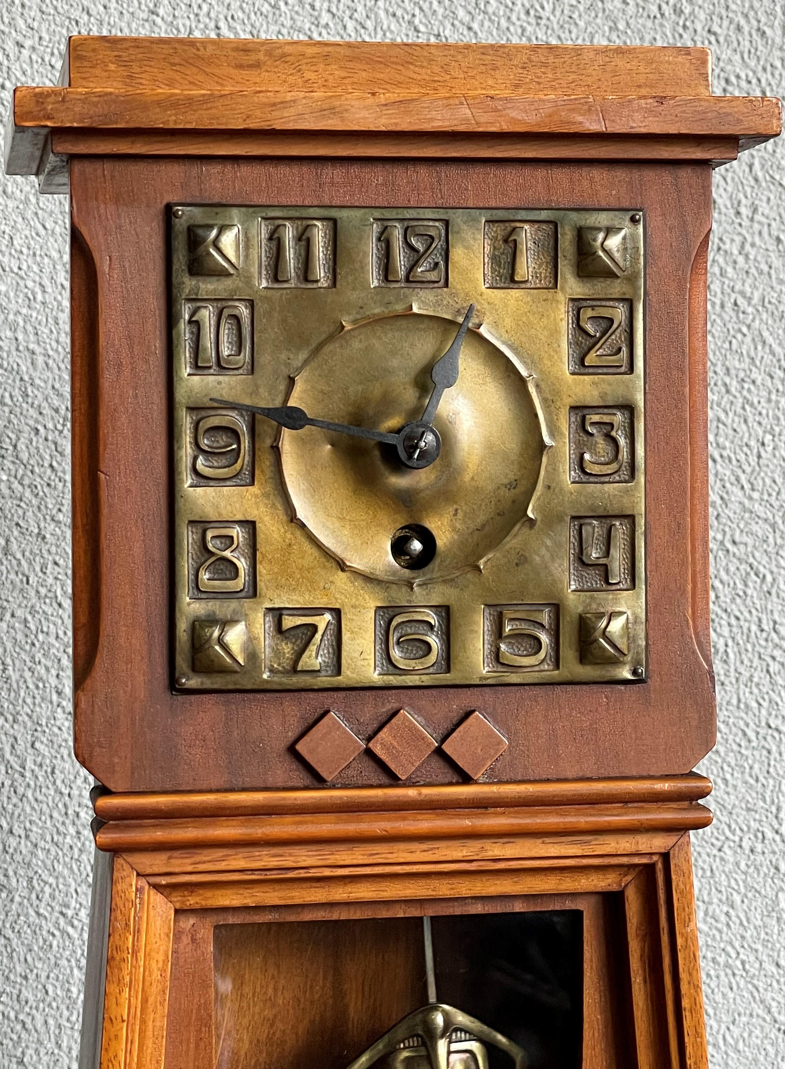 20th Century Arts and Crafts Nutwood Mantel or Table Clock with an Embossed Brass Dial Face For Sale