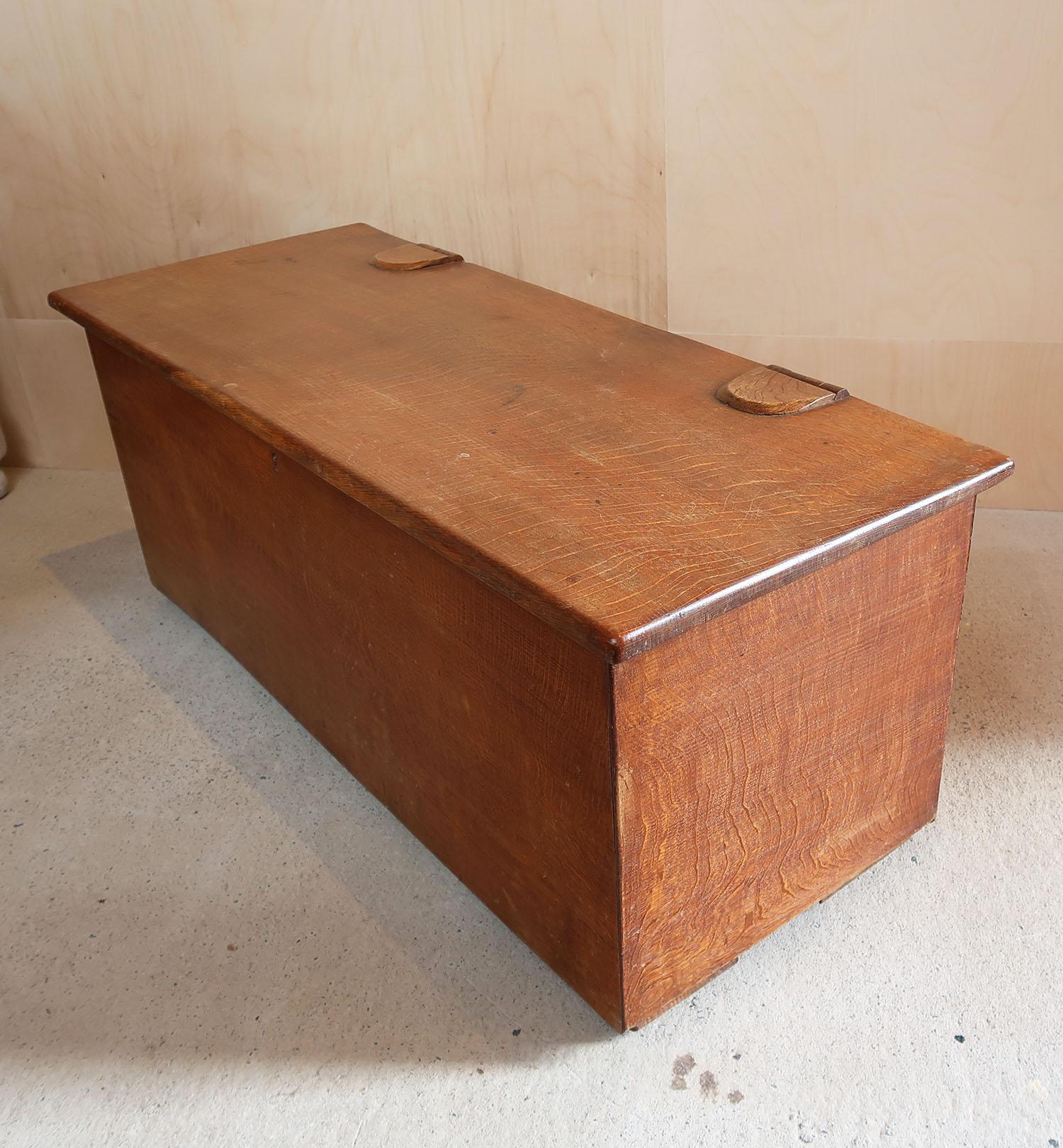 Wonderful oak chest or box.

This is a very special piece. The best quality of cabinet making and the finest choice of timber.

Probably made in the Cotswolds, England

The hinges are wooden and also wooden wheels underneath

Great for the