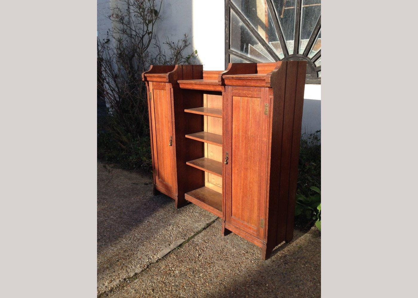 English Arts and Crafts Oak Bookcase Attributed to Lambs of Manchester For Sale