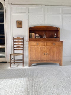 Arts and Crafts oak dresser by Heal & Son