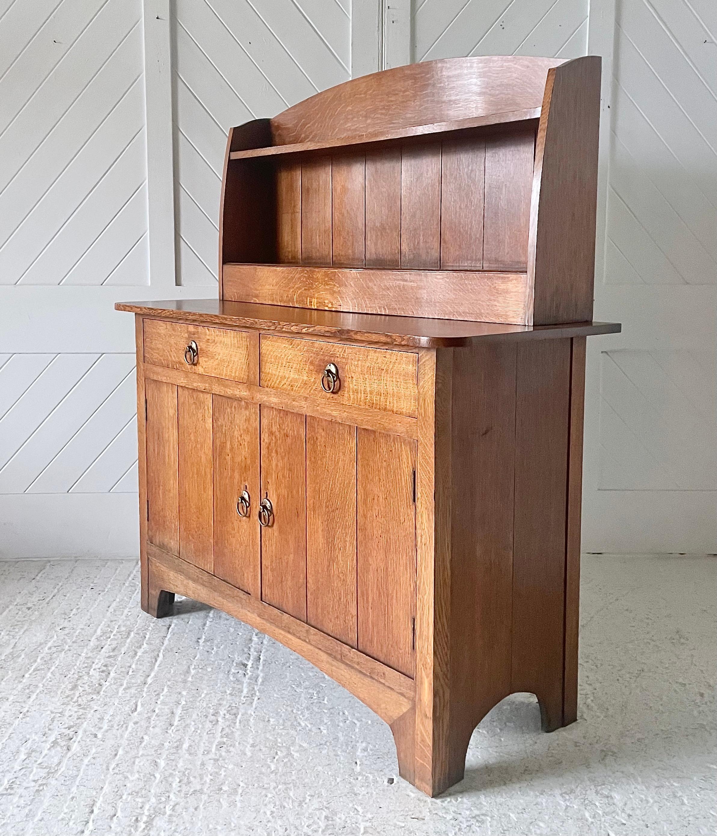 Woodwork Arts and Crafts oak dresser by Heal & Son 