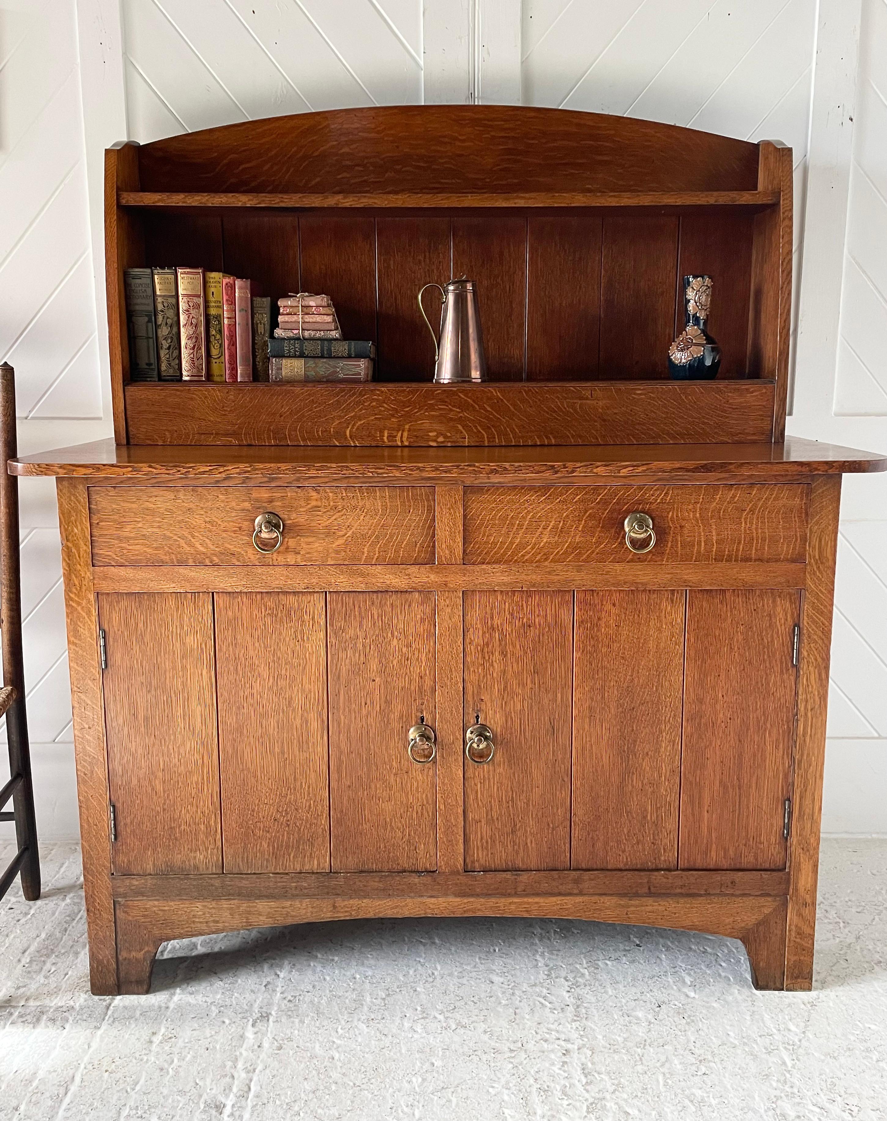 Oak Arts and Crafts oak dresser by Heal & Son  For Sale