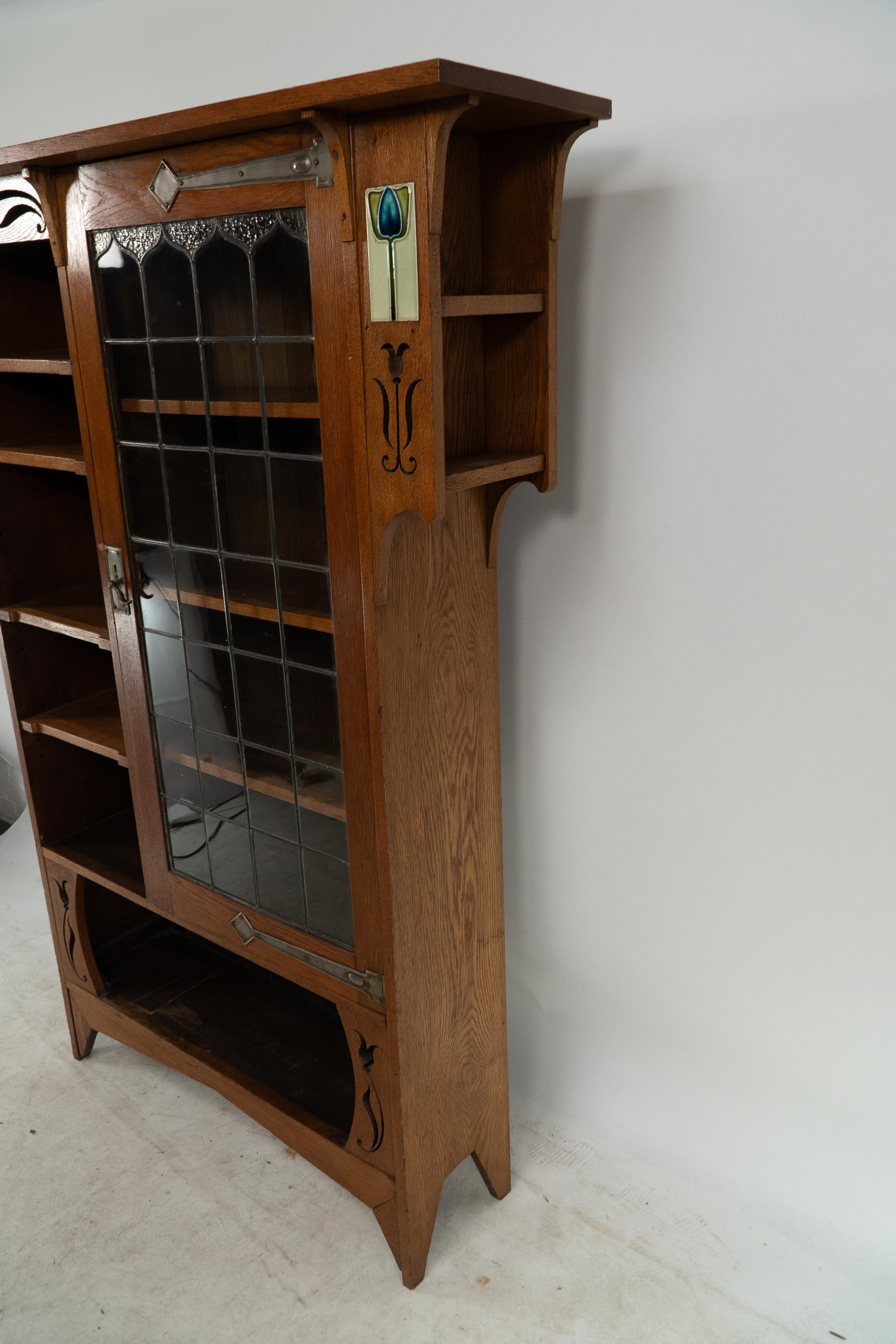 20th Century Arts and Crafts Oak Glazed Bookcase with inset period tiles For Sale