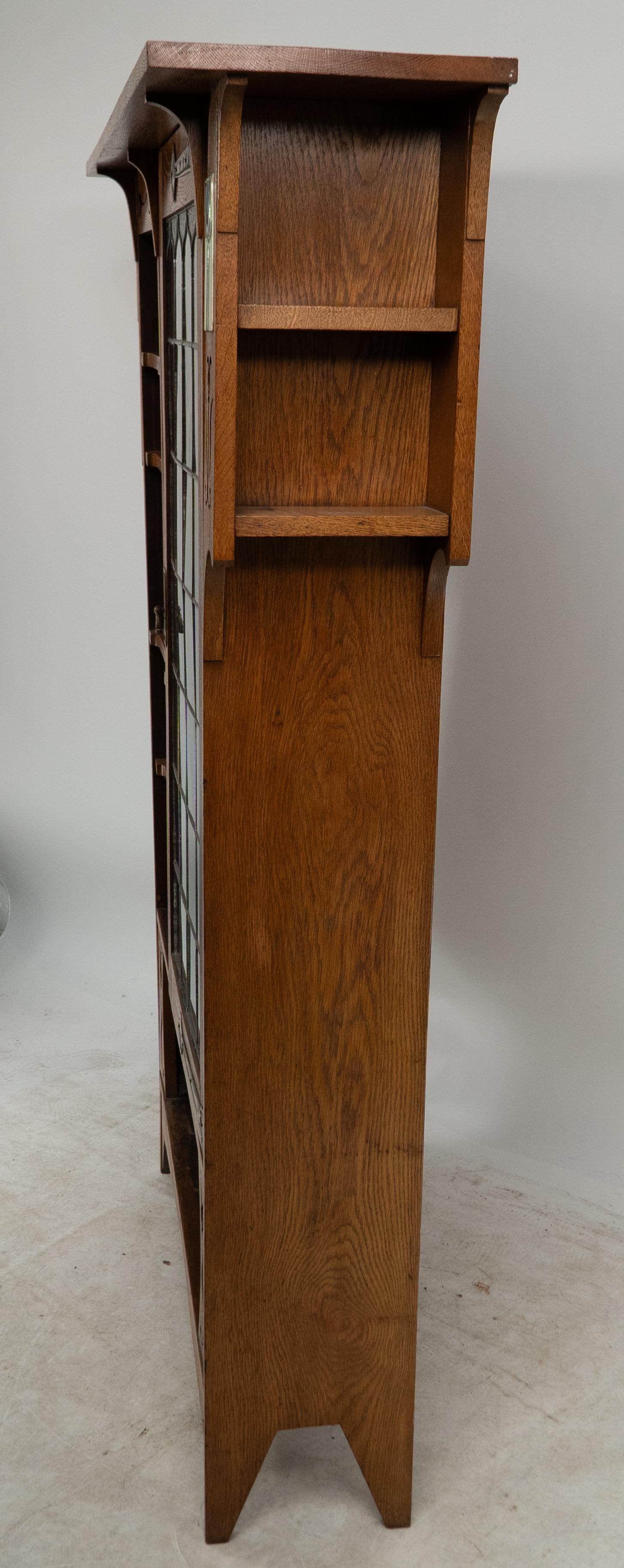 Arts and Crafts Oak Glazed Bookcase with inset period tiles For Sale 1