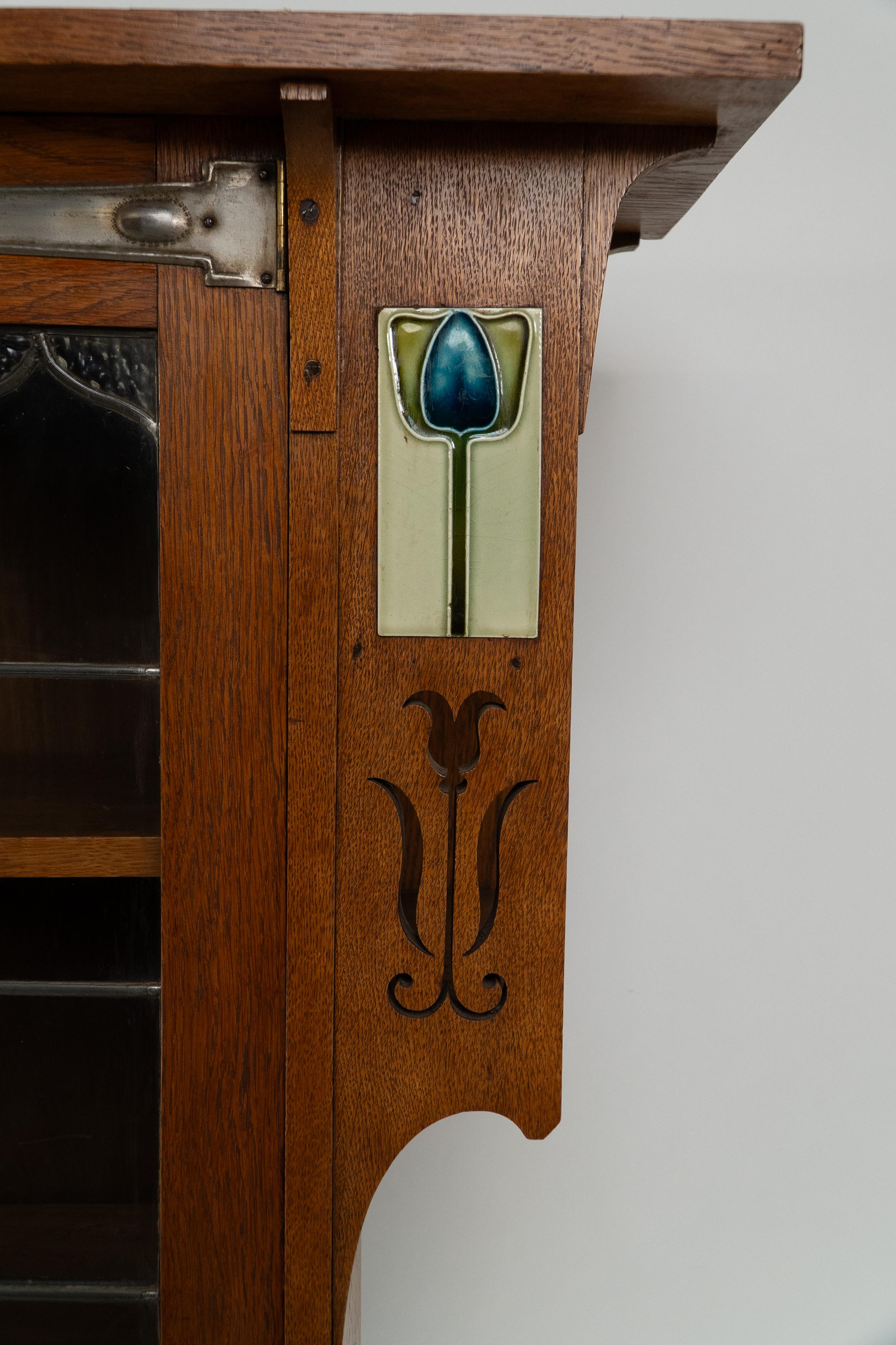 Arts and Crafts Oak Glazed Bookcase with inset period tiles For Sale 5