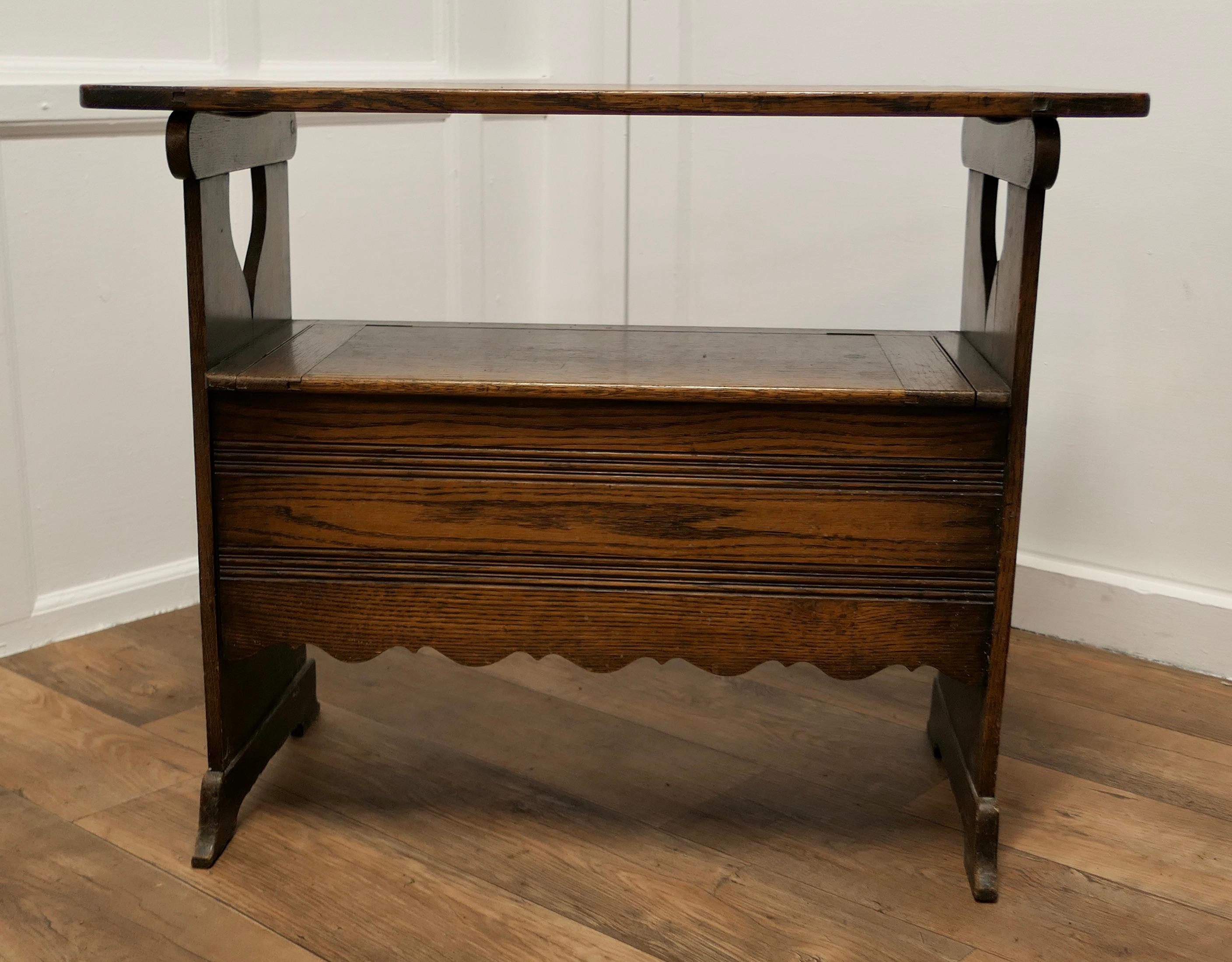 Arts and Crafts Oak Monks Bench Settle, Hall table

This useful piece is known as a Monks Bench, it is in fact a settle with storage compartment inside the seat and the back of the bench can be pulled over, it then rests on the on the top of the