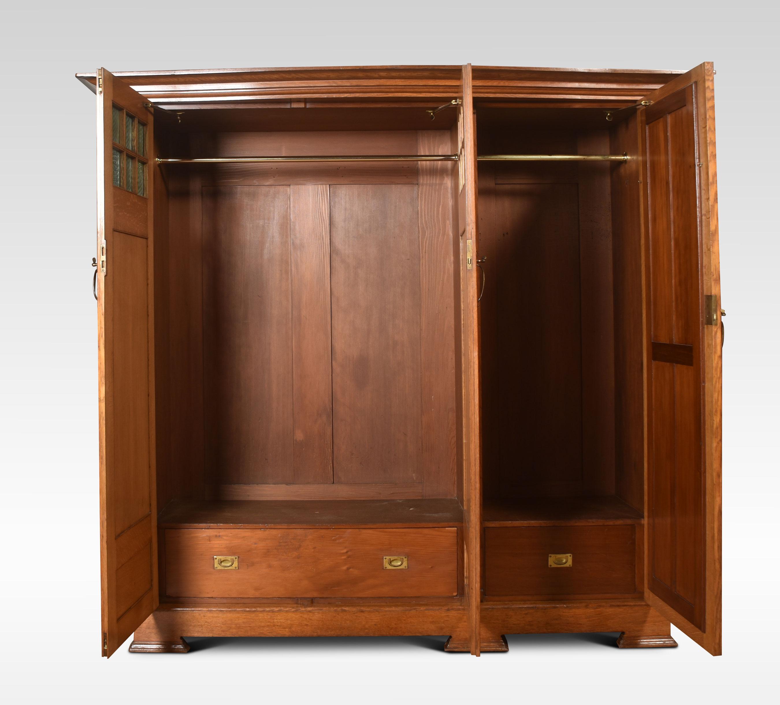 20th Century Arts and Crafts Oak Three Door Wardrobe