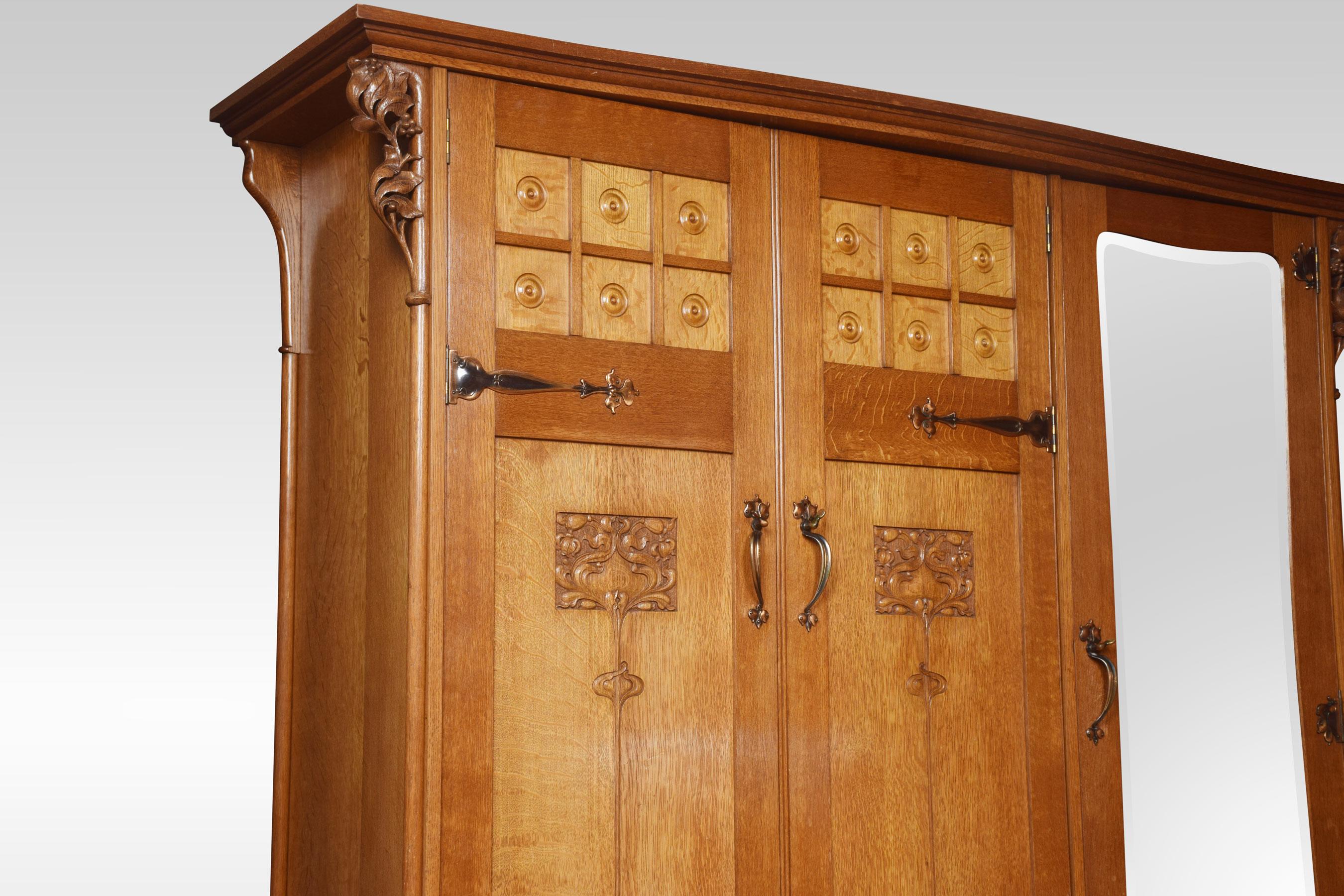 20th Century Arts and Crafts Oak Three Door Wardrobe
