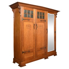 Arts and Crafts Oak Three Door Wardrobe