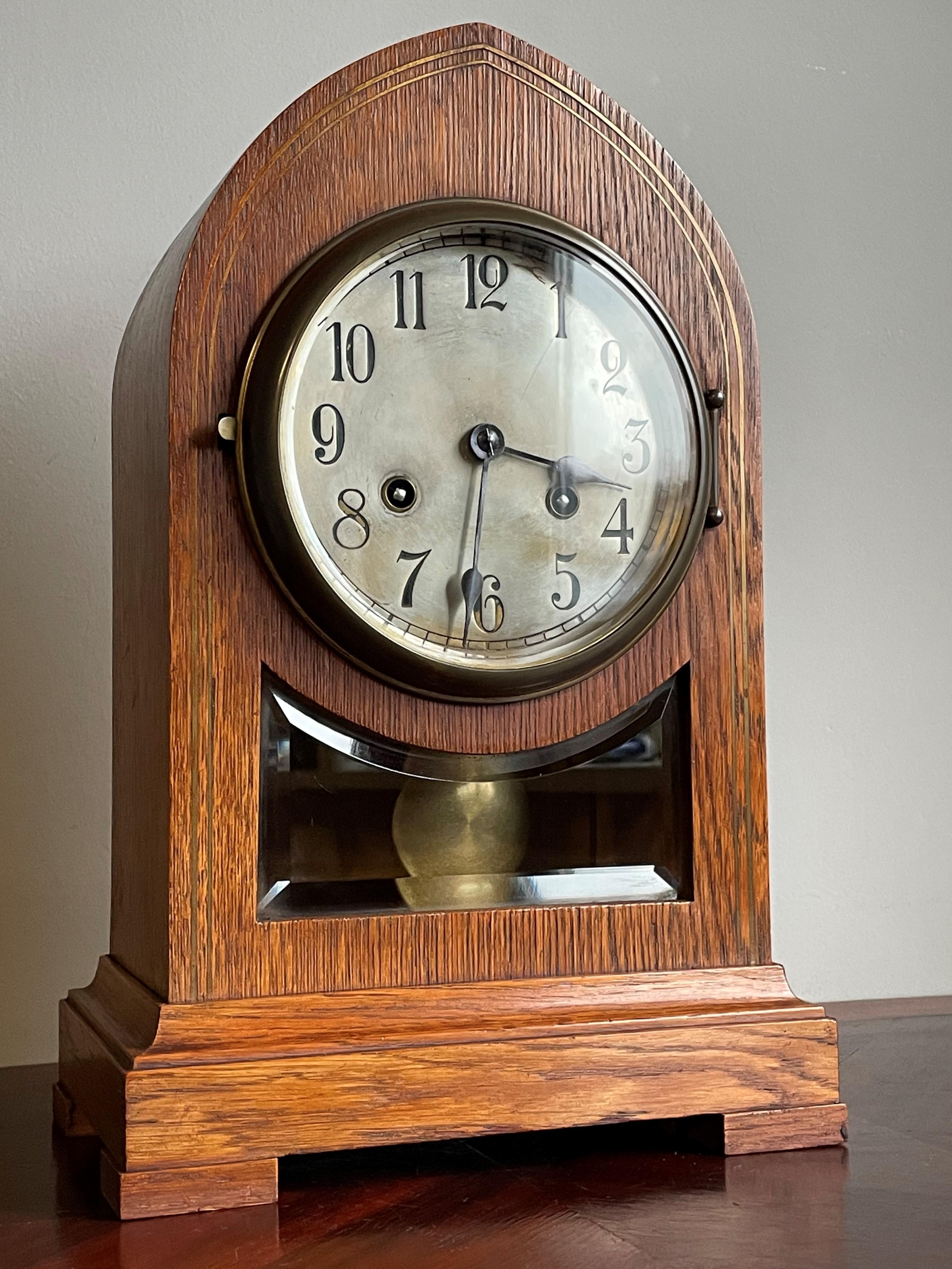 Beautiful and stylish clock, in good working order.

If you are looking for an exceptionally designed clock from the Arts & Crafts era then this rare mantel clock could be yours to enjoy soon. You will rarely find a table clock from the Arts &