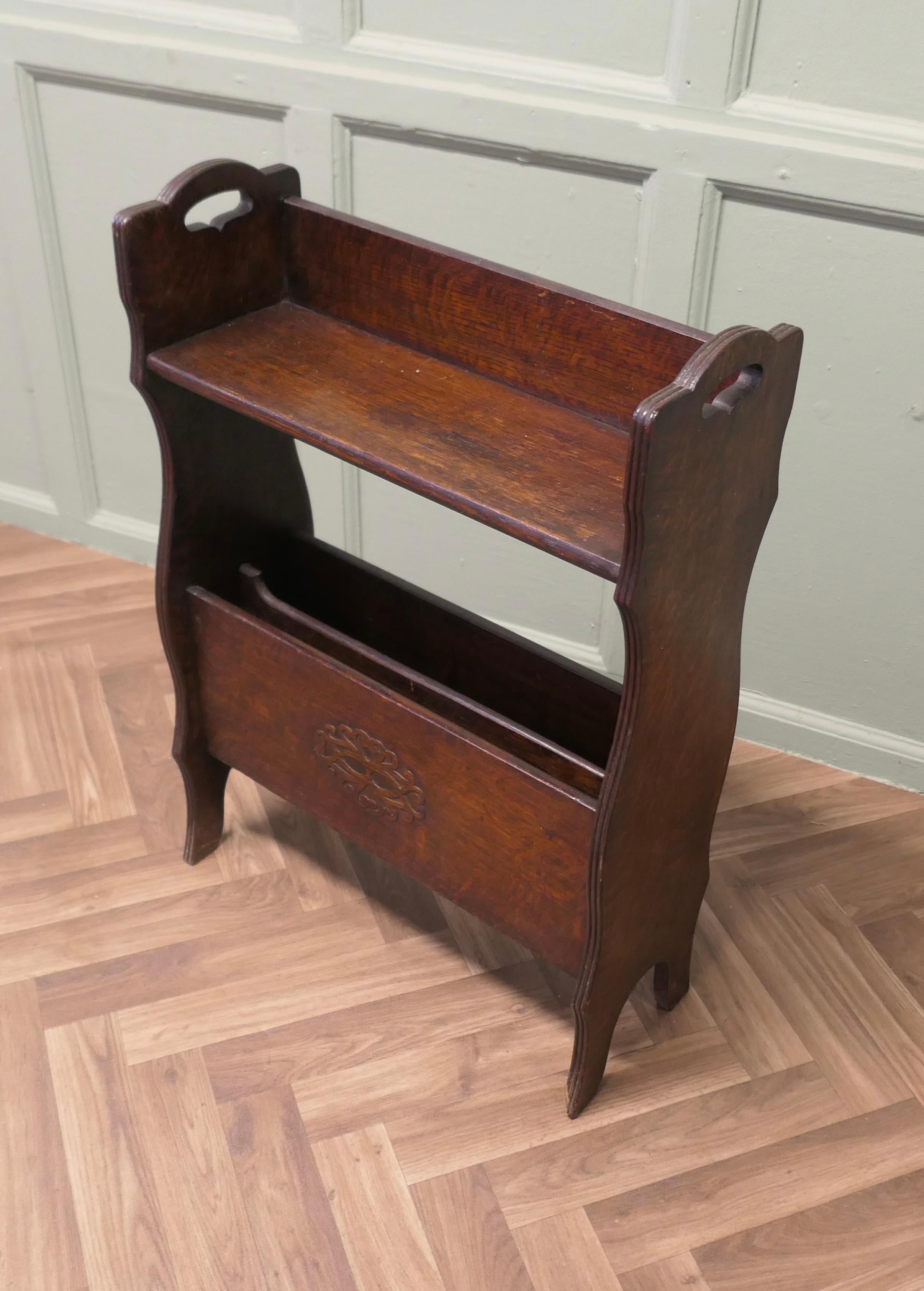 Arts and Crafts Open Front Oak Bookcase with Magazine Rack

This Oak bookcase has an open shelf with a gallery around , below this there is a deep divided Magazine rack, the bookcase can be easily manoeuvred with the handles on the sides. The