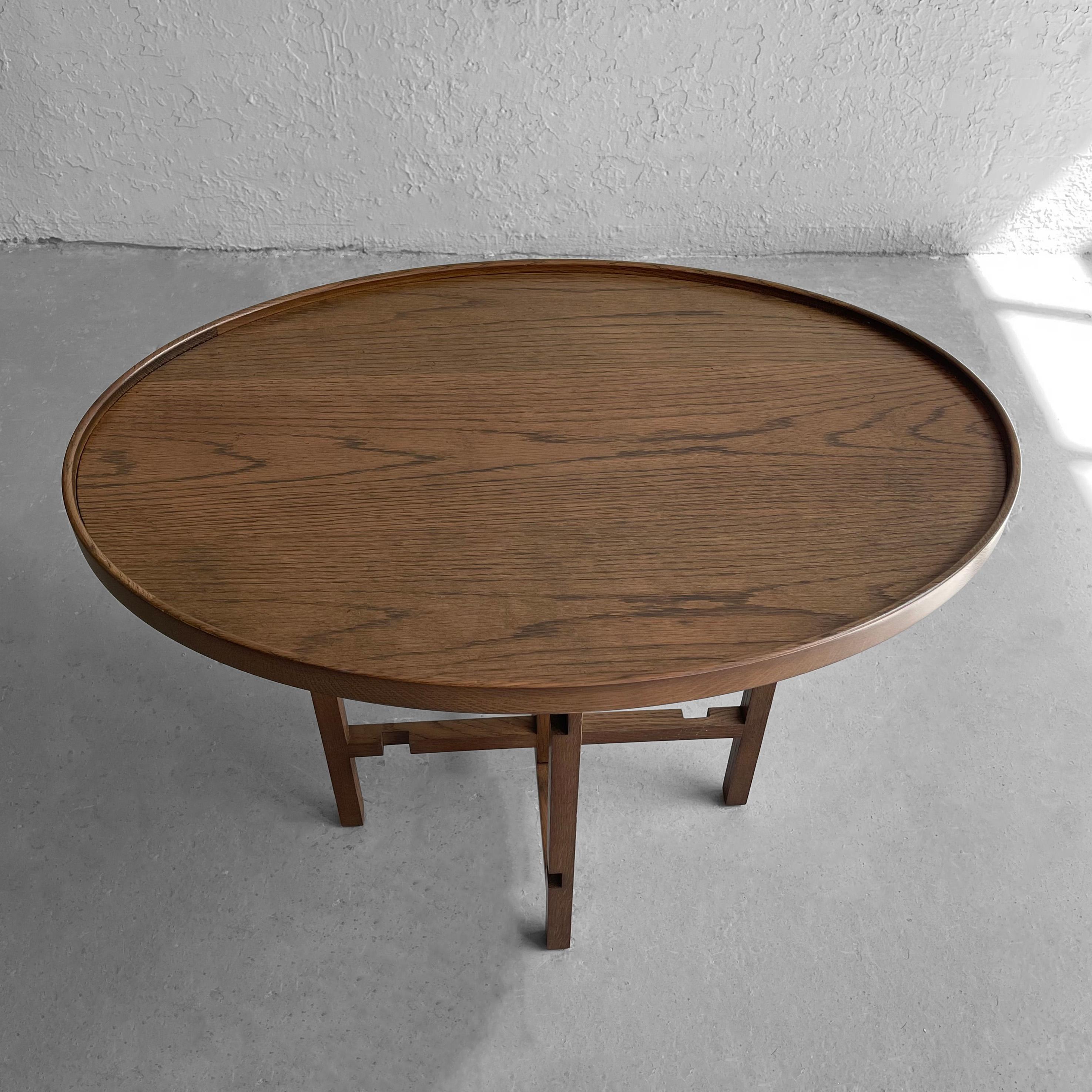 20th Century Arts And Crafts Oval Walnut Side Table For Sale