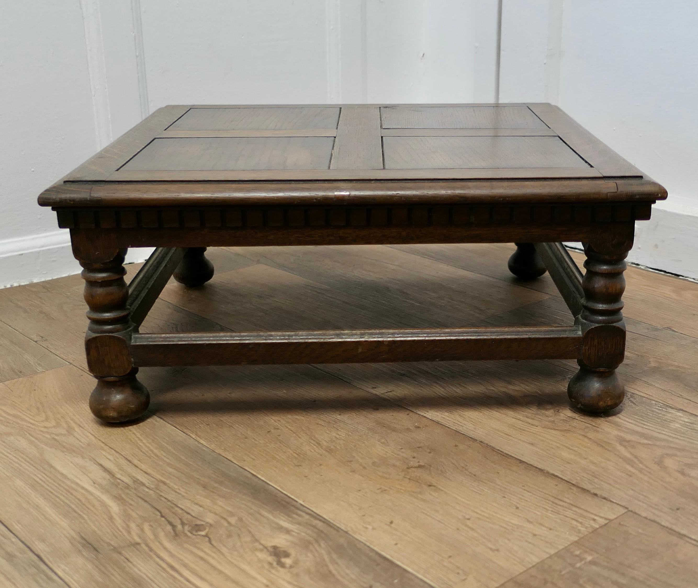 Arts and Crafts Panelled Oak Coffee or Low Table

A stylish piece from the 1920s
A superb oak Coffee Table with turned stretchered legs, this is a very attractive sturdy piece
The construction of the table is solid oak it is in very good antique