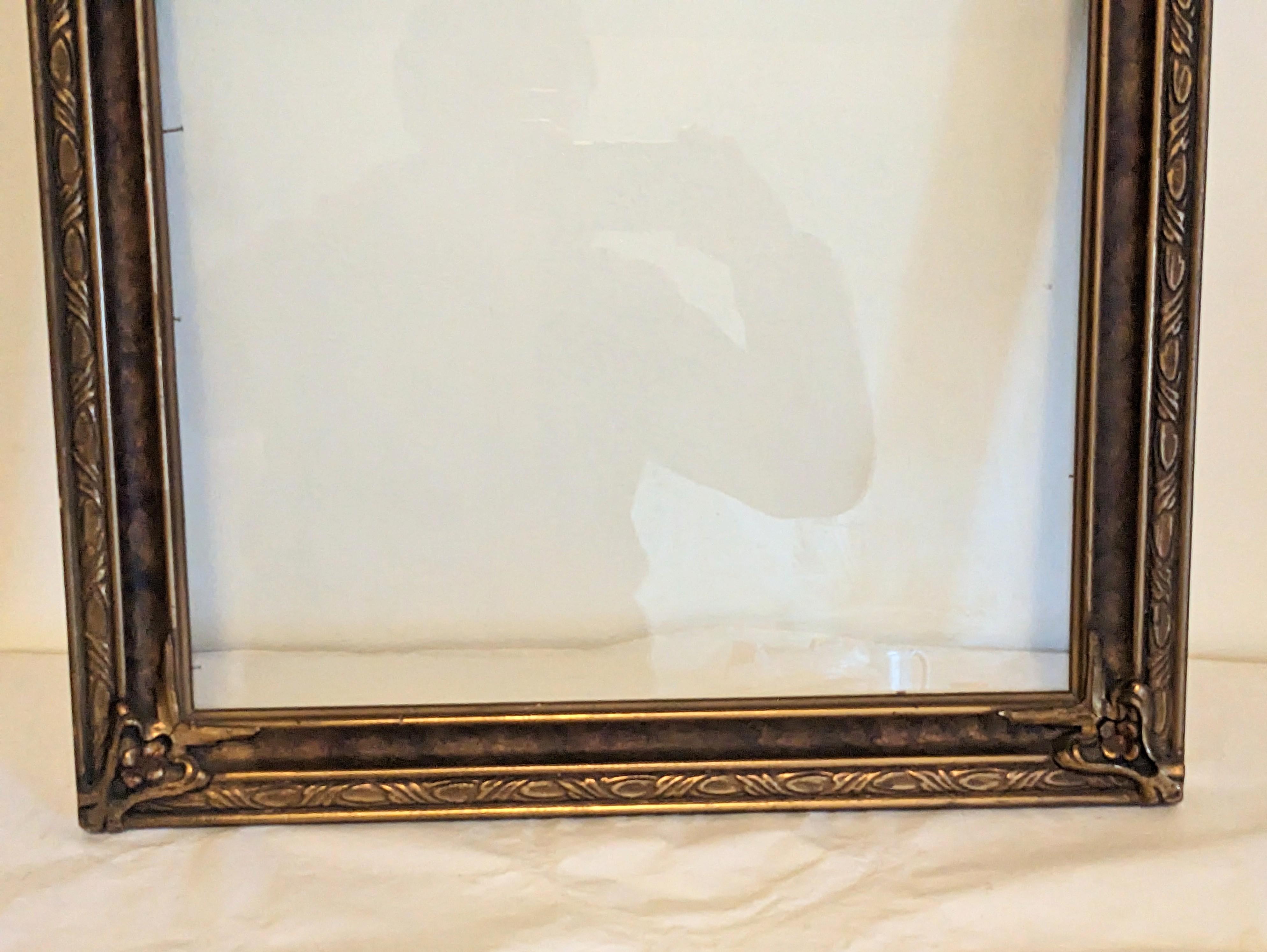 Gilt Arts and Crafts Patinaed Carved Frame For Sale