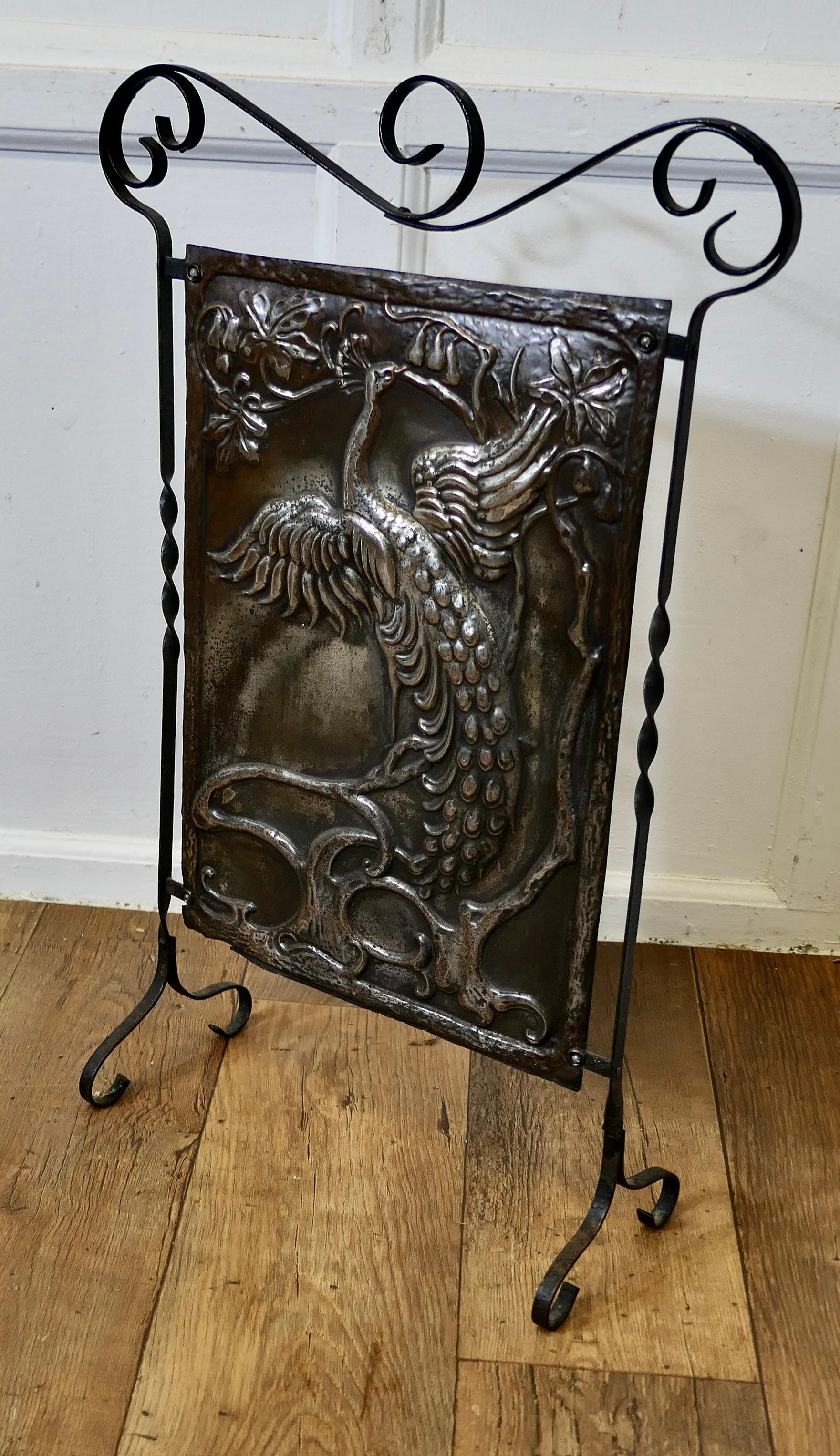Arts and Crafts Peacock Polished Iron Fire Screen  This is a Classic In Good Condition For Sale In Godshill, Isle of Wight