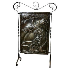 Antique Arts and Crafts Peacock Polished Iron Fire Screen  This is a Classic  