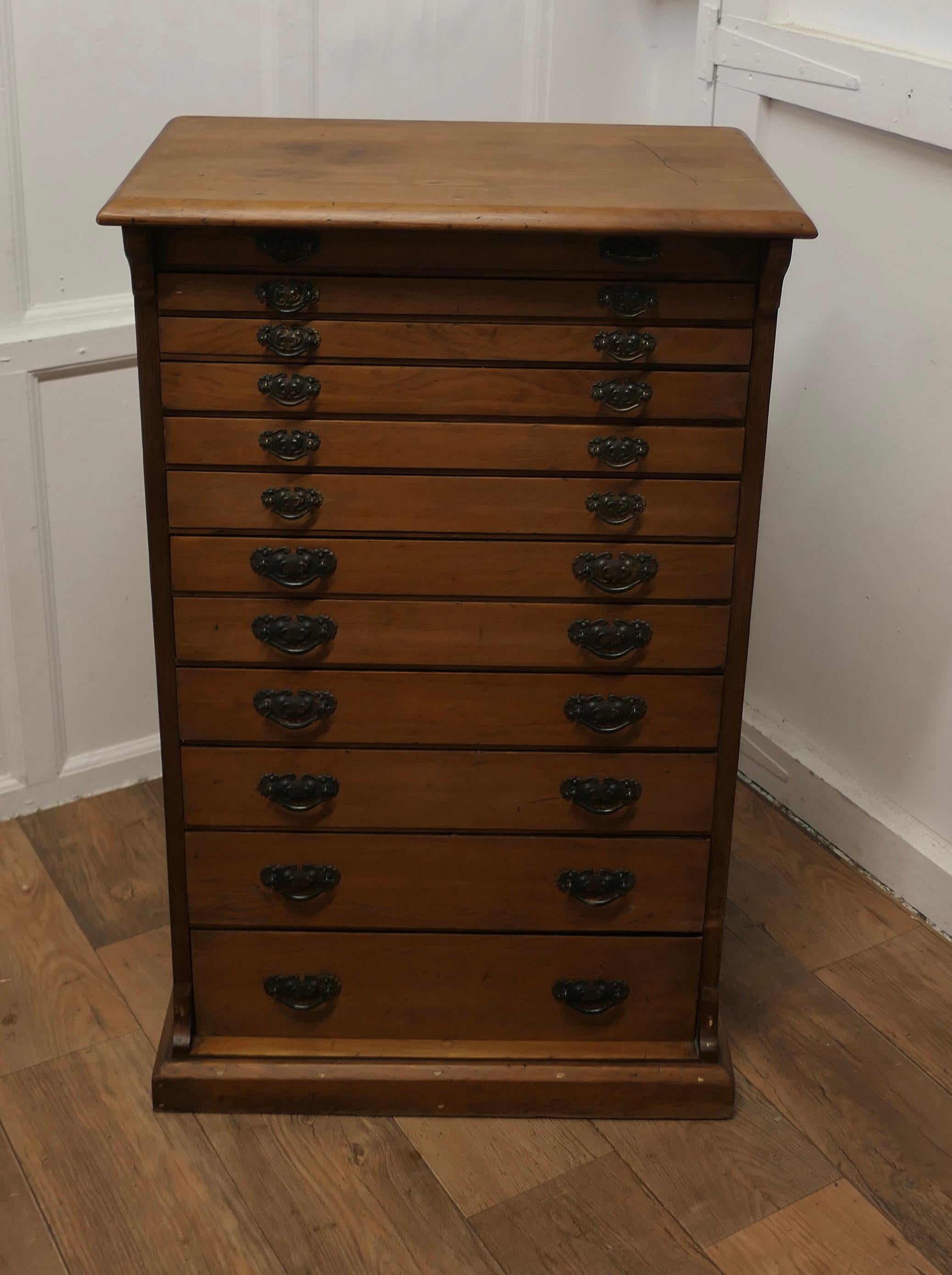 Arts and Crafts Pine Collectors Cabinet Filing Drawers

The Cabinet is made in natural pine and has 12 Long Drawers, some of the drawers have the original dividers others are missing, if you require to remove them all this is simple as they are not