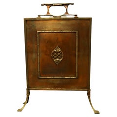 Parafuoco in ottone rosa Arts and Crafts