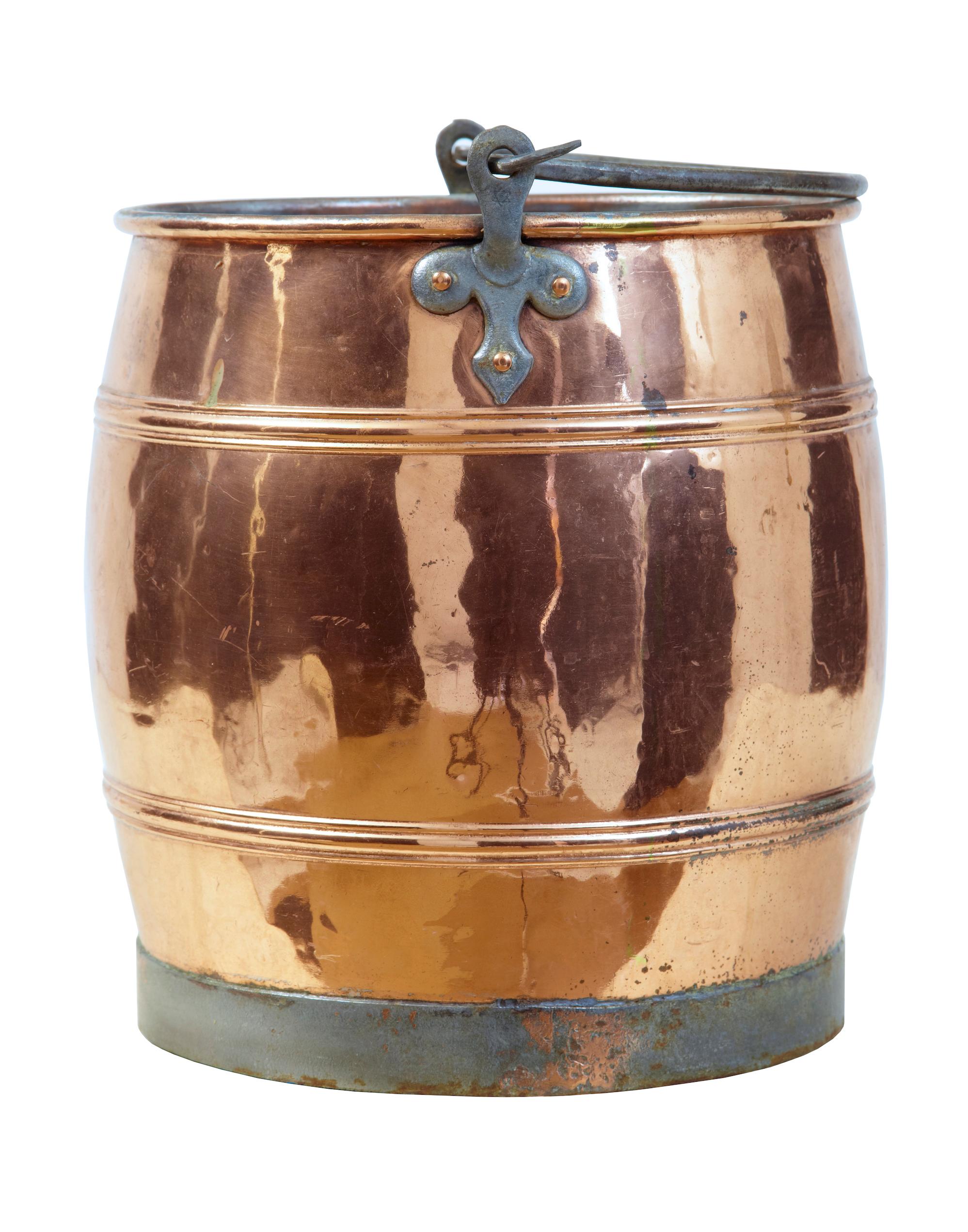 Arts & Crafts Scandinavian copper bucket, circa 1890.

Good quality keg barrel shaped copper pail, with steel handle and bottom rim. Ideal for use as a log bin or waste paper basket.

Expected surface marks.