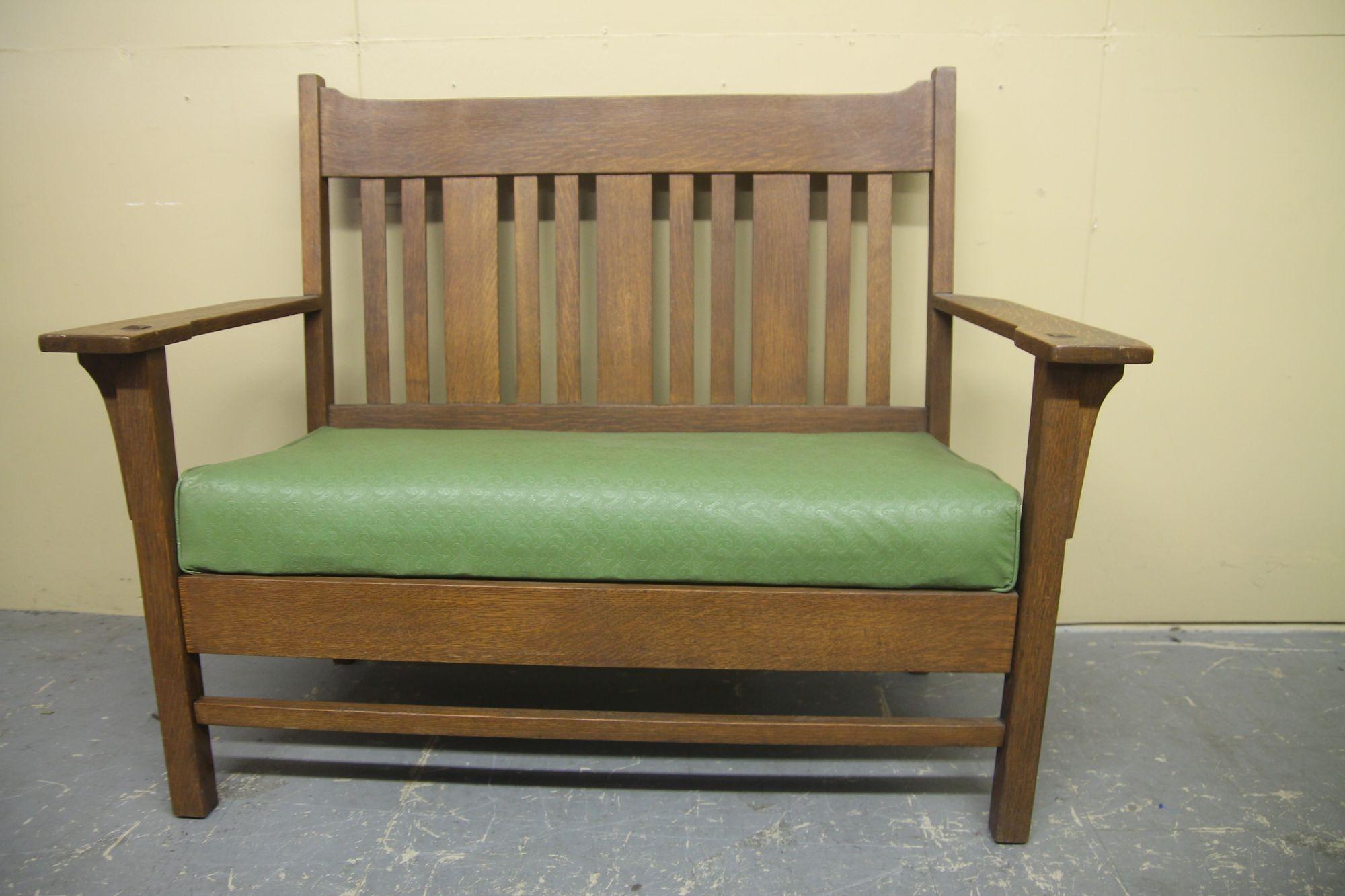 Pleased to offer a nice Arts and Crafts quarter sawn oak love seat. This Harden piece retains its original finish.