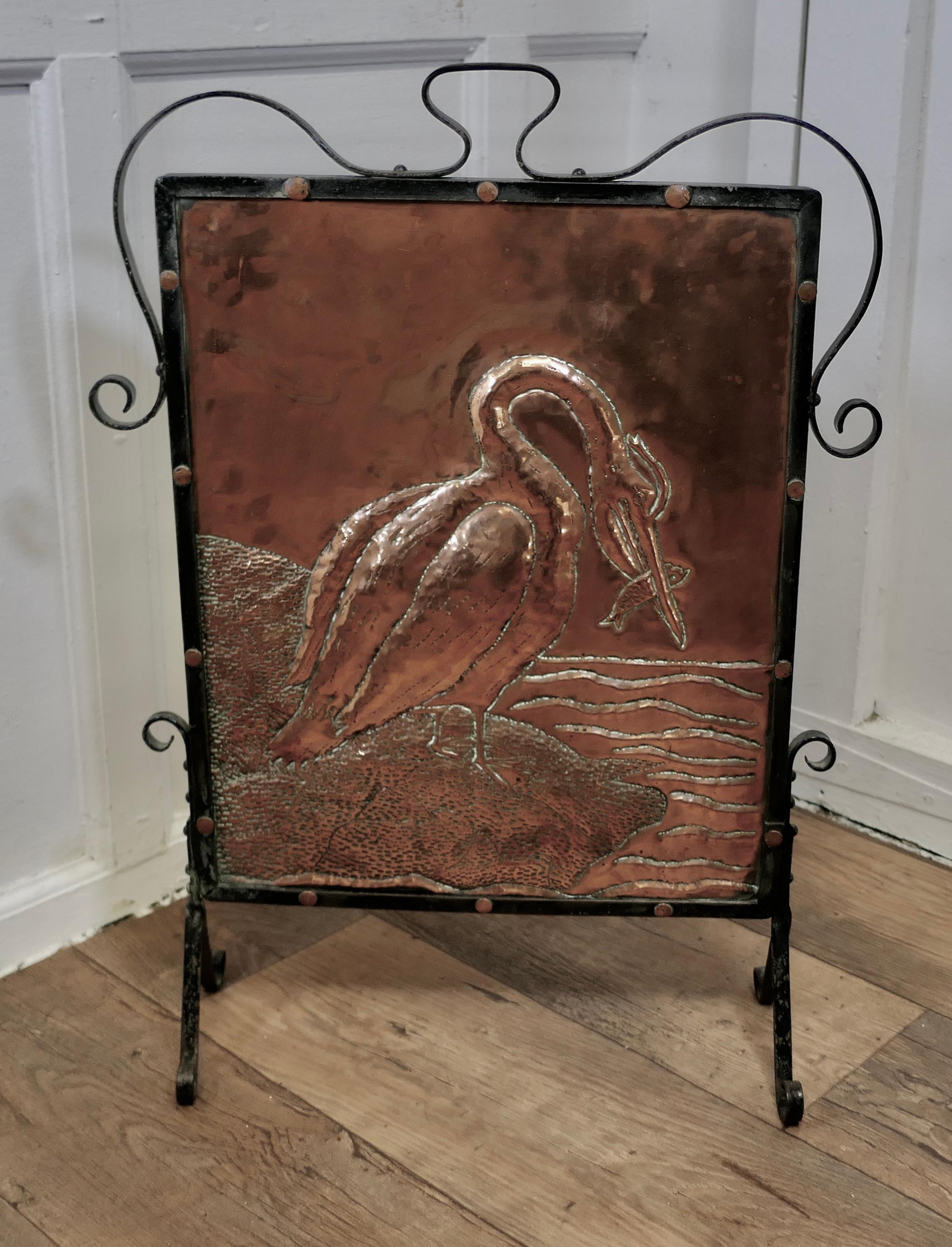 Arts and Crafts Stork and Fish Copper and Iron Fire Screen

This is a Classic in the Arts and Crafts Style, it is a hand beaten copper screen, which is mounted on very stylish wrought Iron feet which carry all the way to the top culminating with