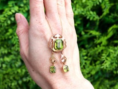Arts and Crafts Style 14.81 Carat Peridot 15k Yellow Gold Necklace Circa 1900