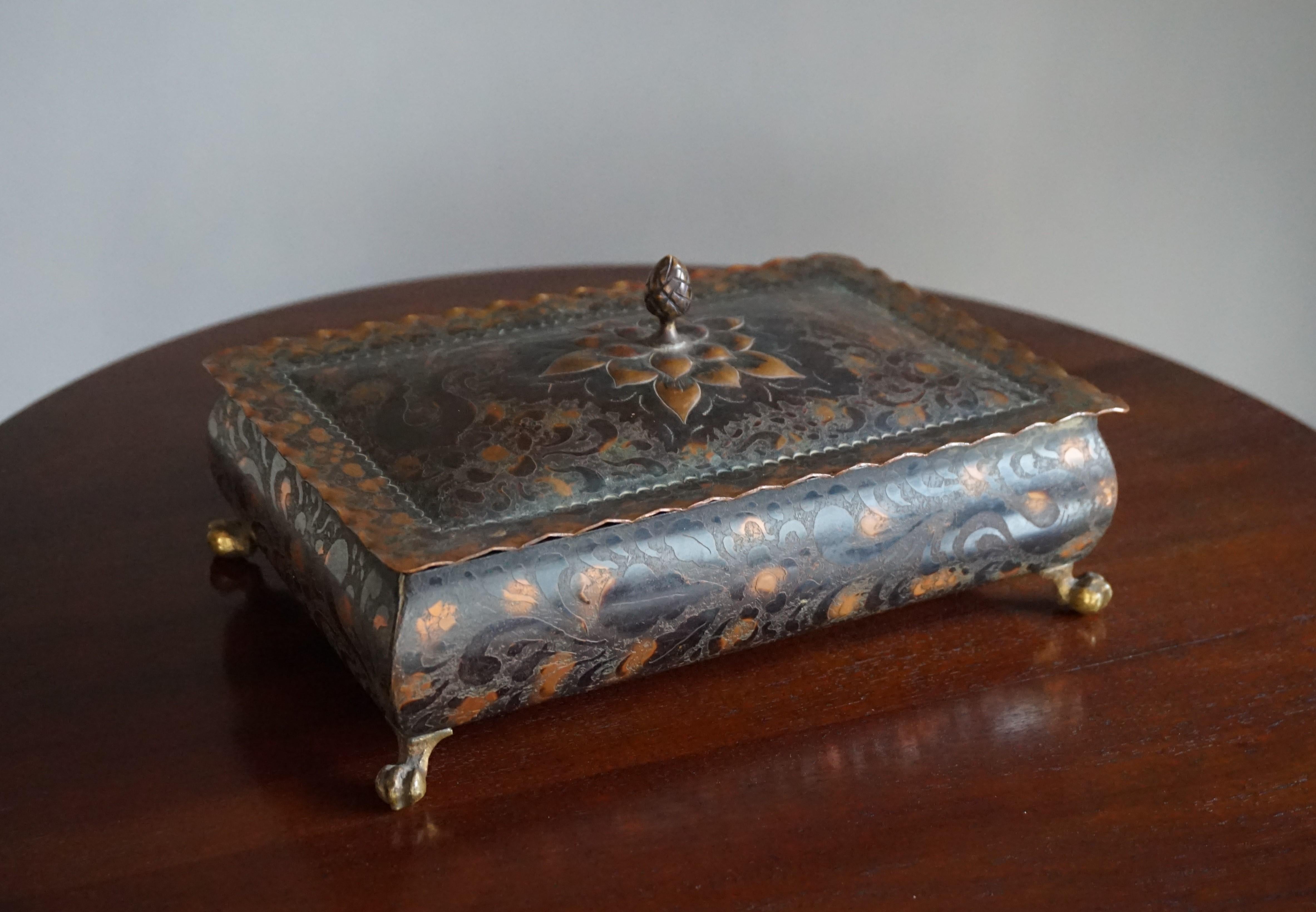 Aesthetically beautiful and highly practical copper metal box.

This 1930s thick copper box clearly is the work of a true artisan of that era. To us, it came to no surprise that it is marked at the bottom. Imprinted in the patinated copper it reads: