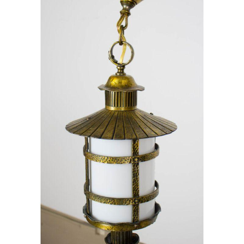 Exterior Lantern, Arts & Crafts style. White glass cylinder. Completely restored and rewired, ready to install. American, C. 1940

Dimensions: 
Height: 24? Overall
Width: 8?
Depth: 8?.