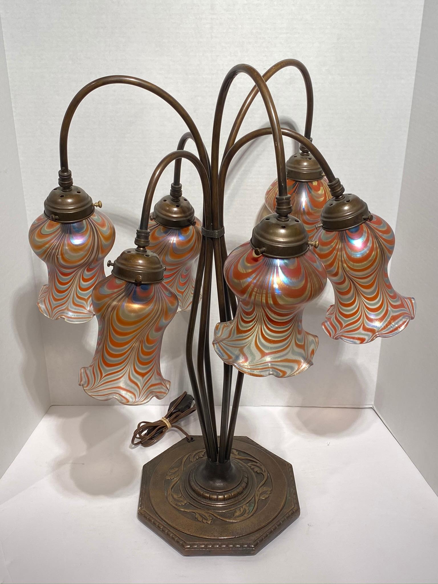 Arts & Crafts style metal and blown glass table lamp from Vandermark Merritt Glass Studios, circa 1972-1990.