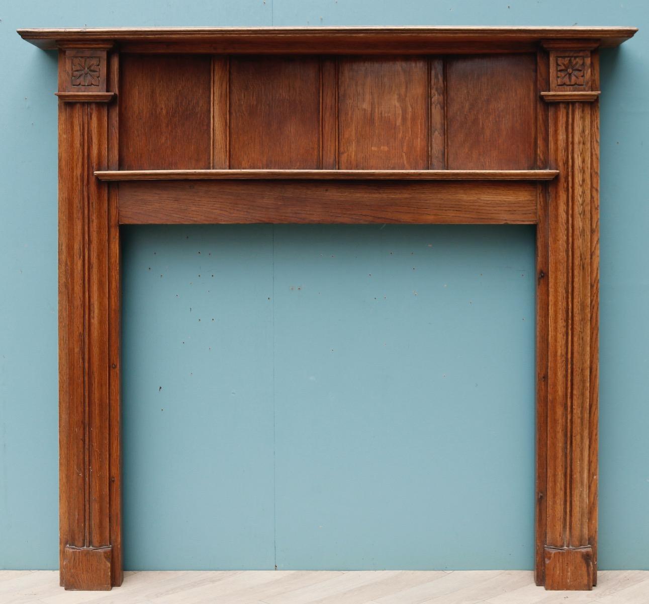An Arts & Crafts style fire surround constructed using traditional methods. The frieze is slightly concave in shape.

Additional Dimensions 

Opening Height 83.5 cm

Opening Width 96 cm

Width between outsides of the foot blocks 125 cm.