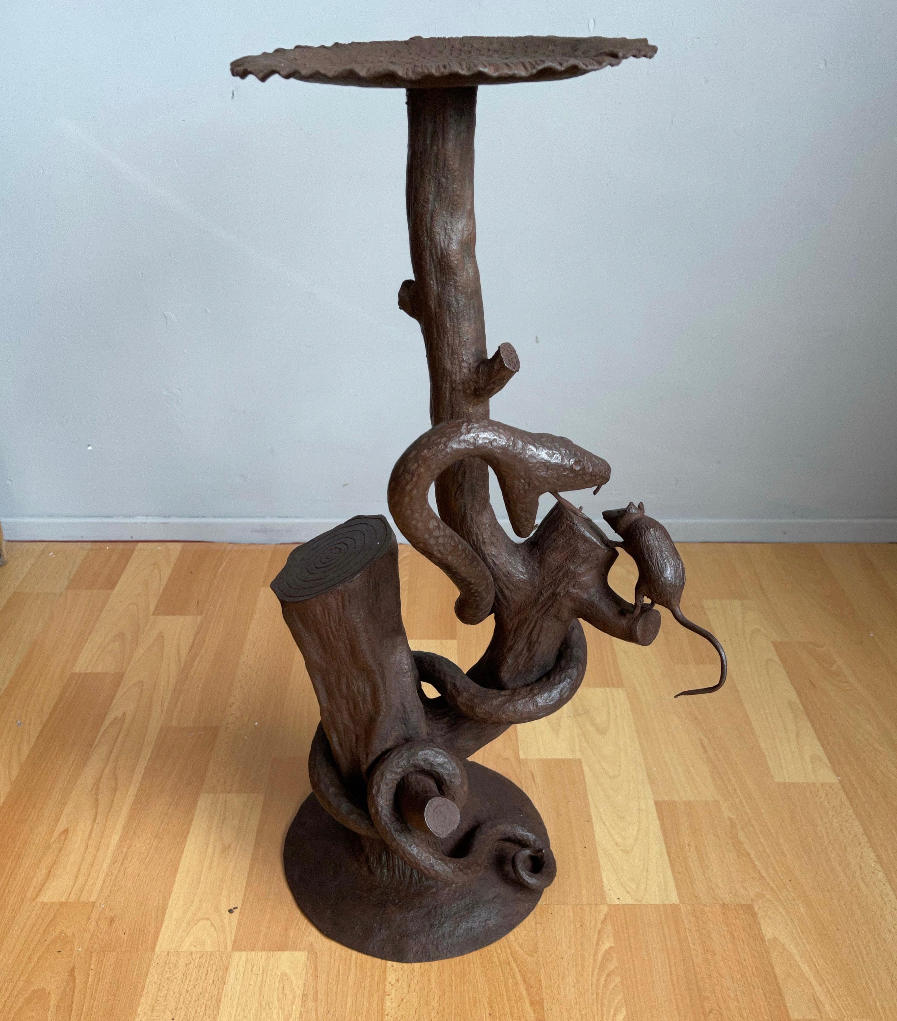 Hand forged, antique work-of-art sculpture or plant stand.

If you are a collector of unique and stylish antiques then this hand-forged wrought iron stand could be perfect for you. In our view the artist has perfectly captured a moment in the animal