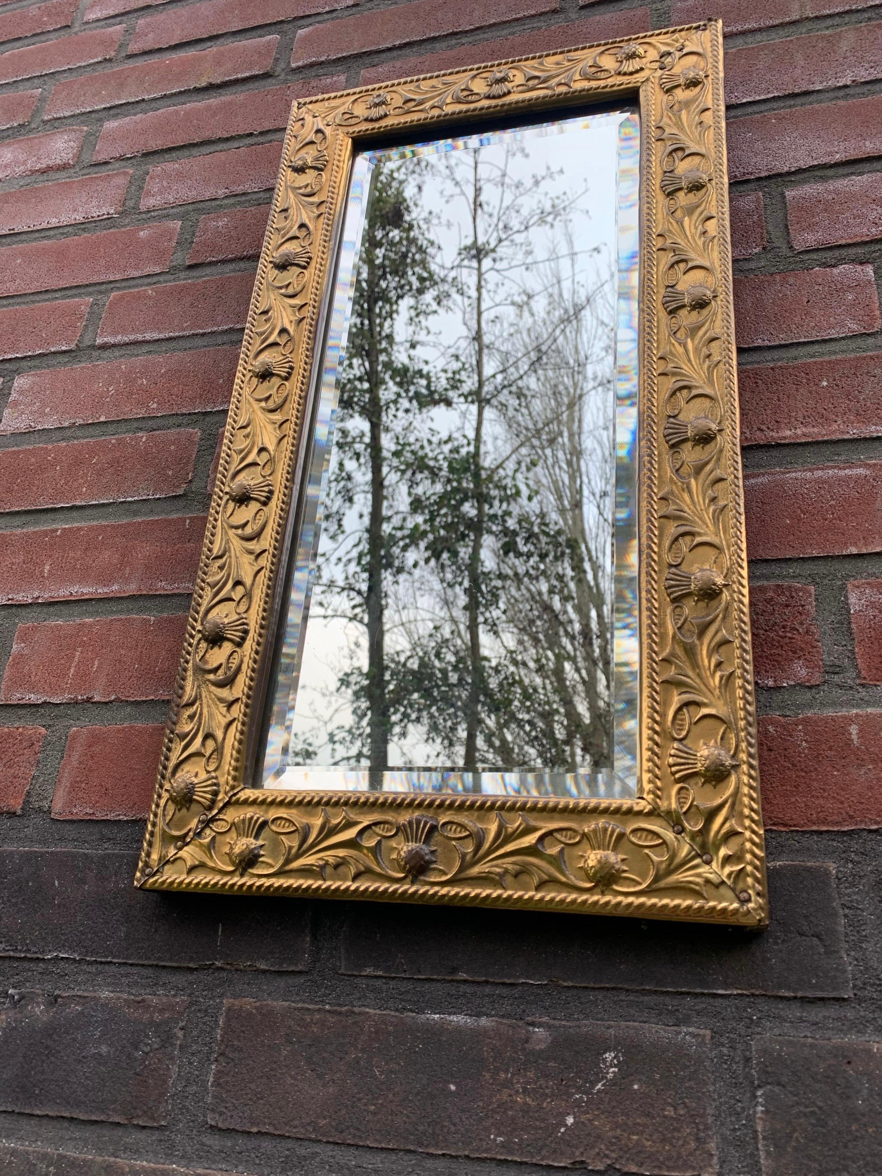 Arts and Crafts Arts & Crafts Wall Mirror with Stylized and Embossed Brass Thistle Flowers Frame