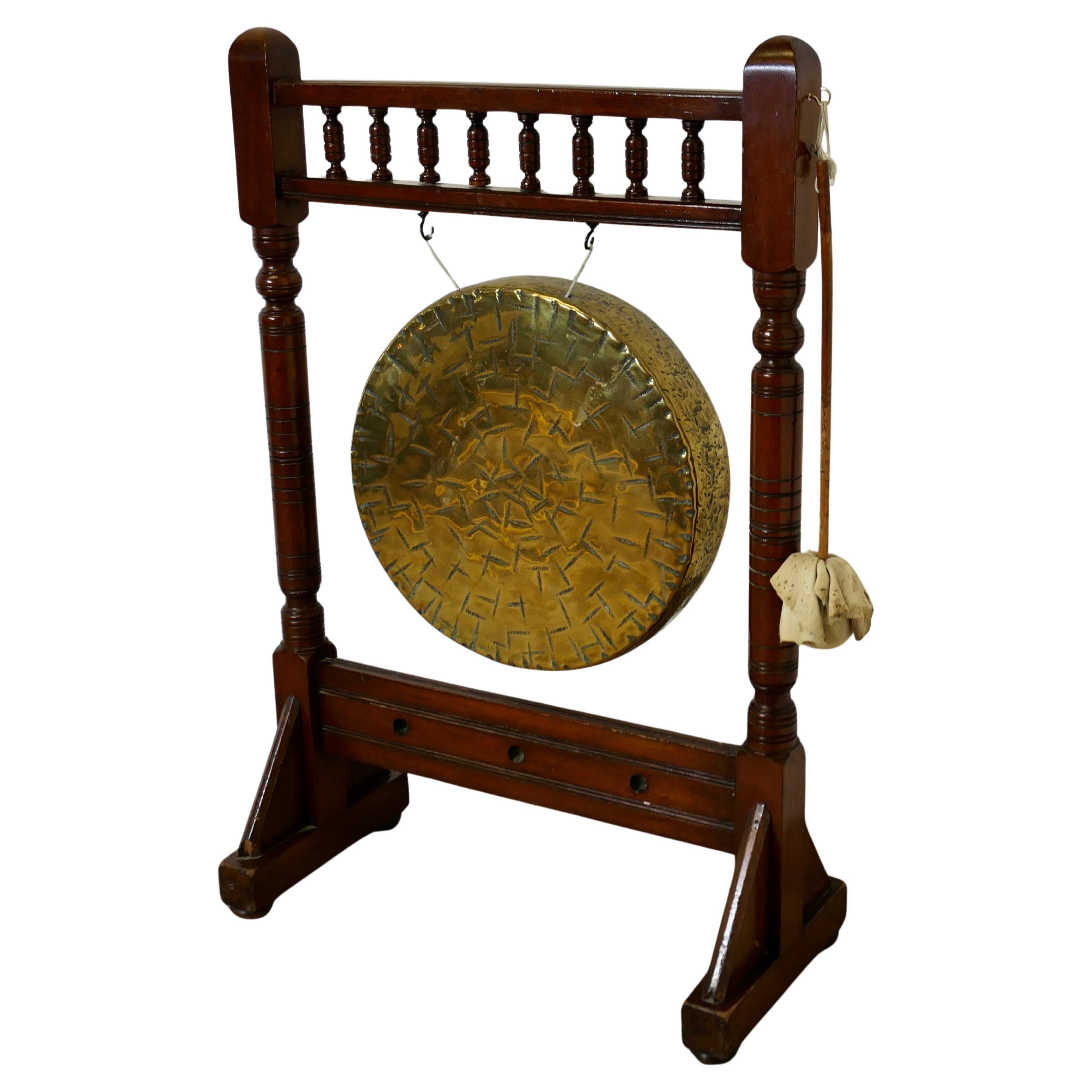 Arts and Crafts Walnut Dinner Gong   This is a large hall piece the Brass Gong For Sale