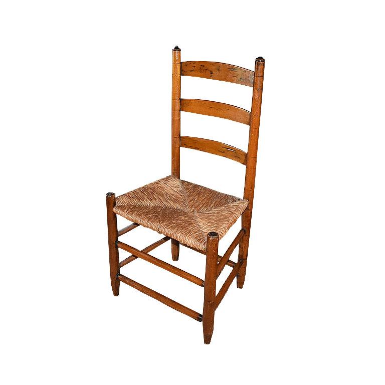 This set of two ladder chairs will make a fabulous addition to a dining room. Each chair features wooden ladder backs and triangular pattern woven seats. 

Dimensions:
18.5