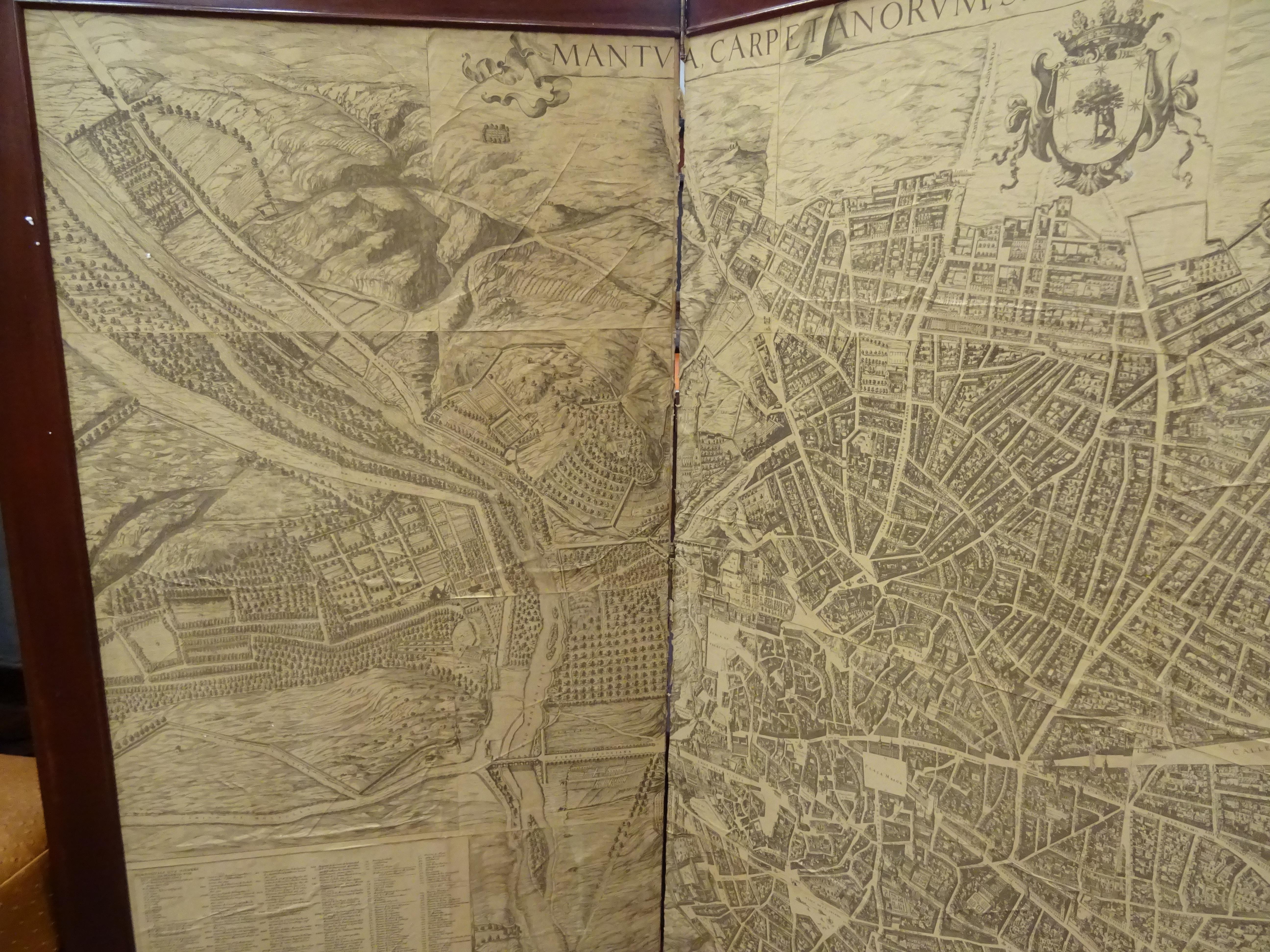 An amazing wooden screen, Arts & Crafts, circa 1900, with an engraving. A Madrid map, from the same epoca. The original engraving was made in 1656 by Pedro Teixeira Portuguese cartographer in the service of King Felipe IV of Spain (Lisboa