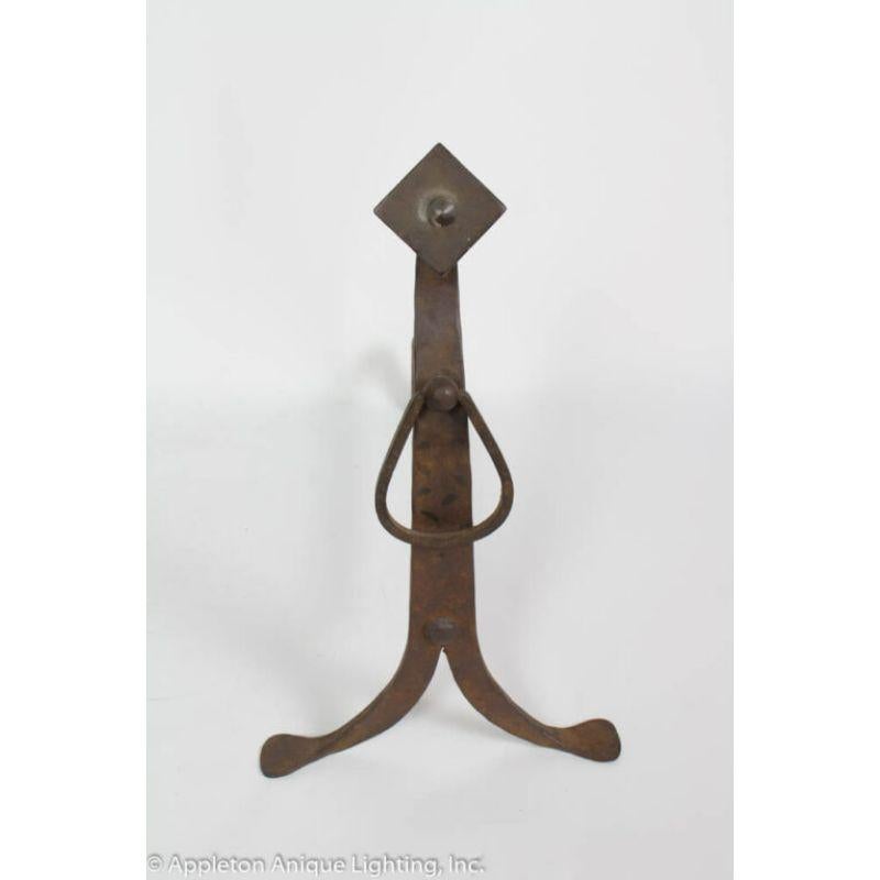 Pair of wrought iron Arts & Crafts Andirons. Beautiful hand work.

Material: wrought iron
Style: Arts & Crafts,Traditional
Place of Origin: United States
Period made: Early 20th Century 
Dimensions: 12 × 20 × 21 in
Condition details: