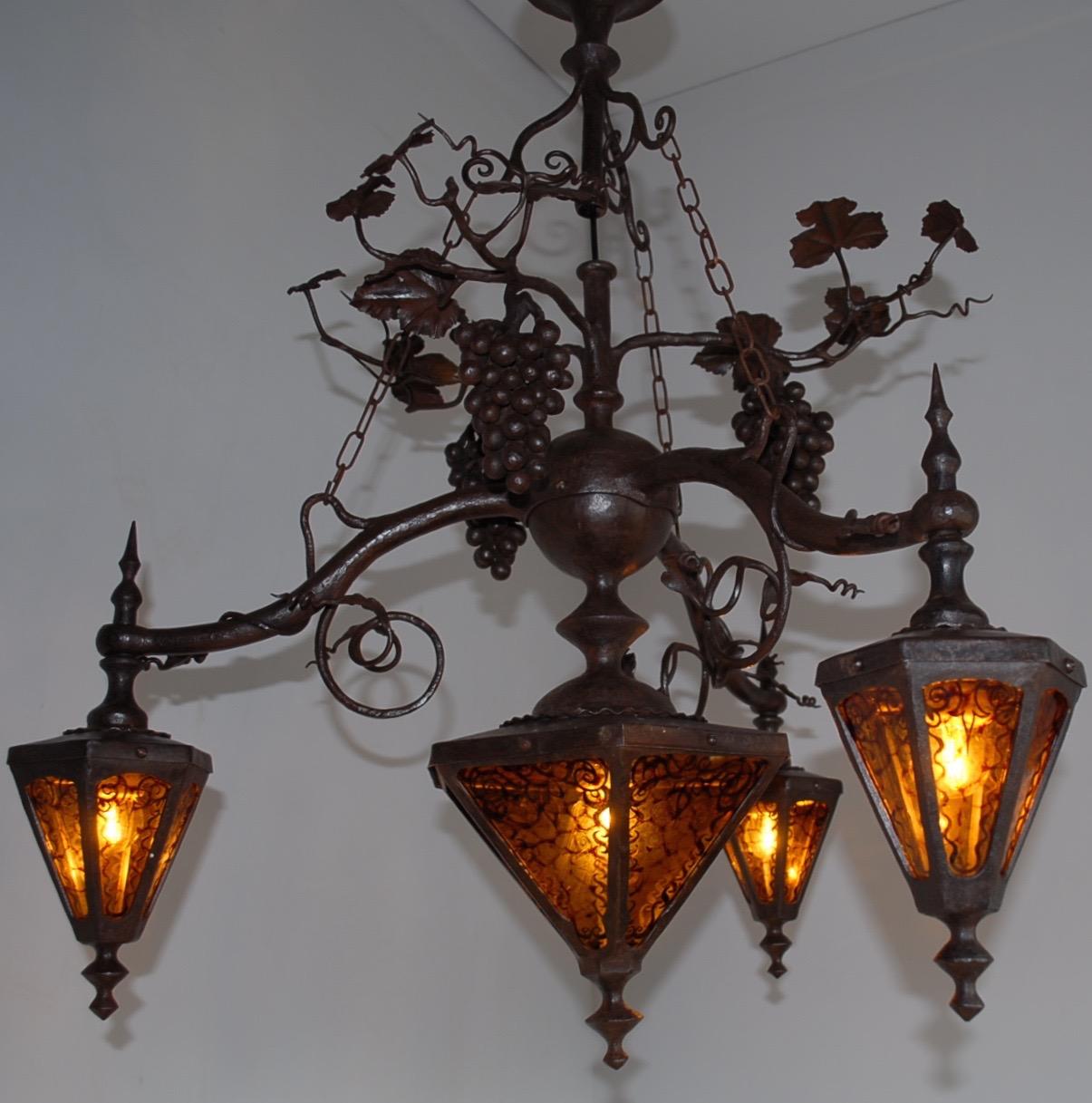 Amazing & marked with a monogram, Arts and Crafts chandelier.

This all-handcrafted work of lighting art is the only one of its kind and in an amazing condition. If you are a collector of top-quality, early 20th century workmanship then this forged