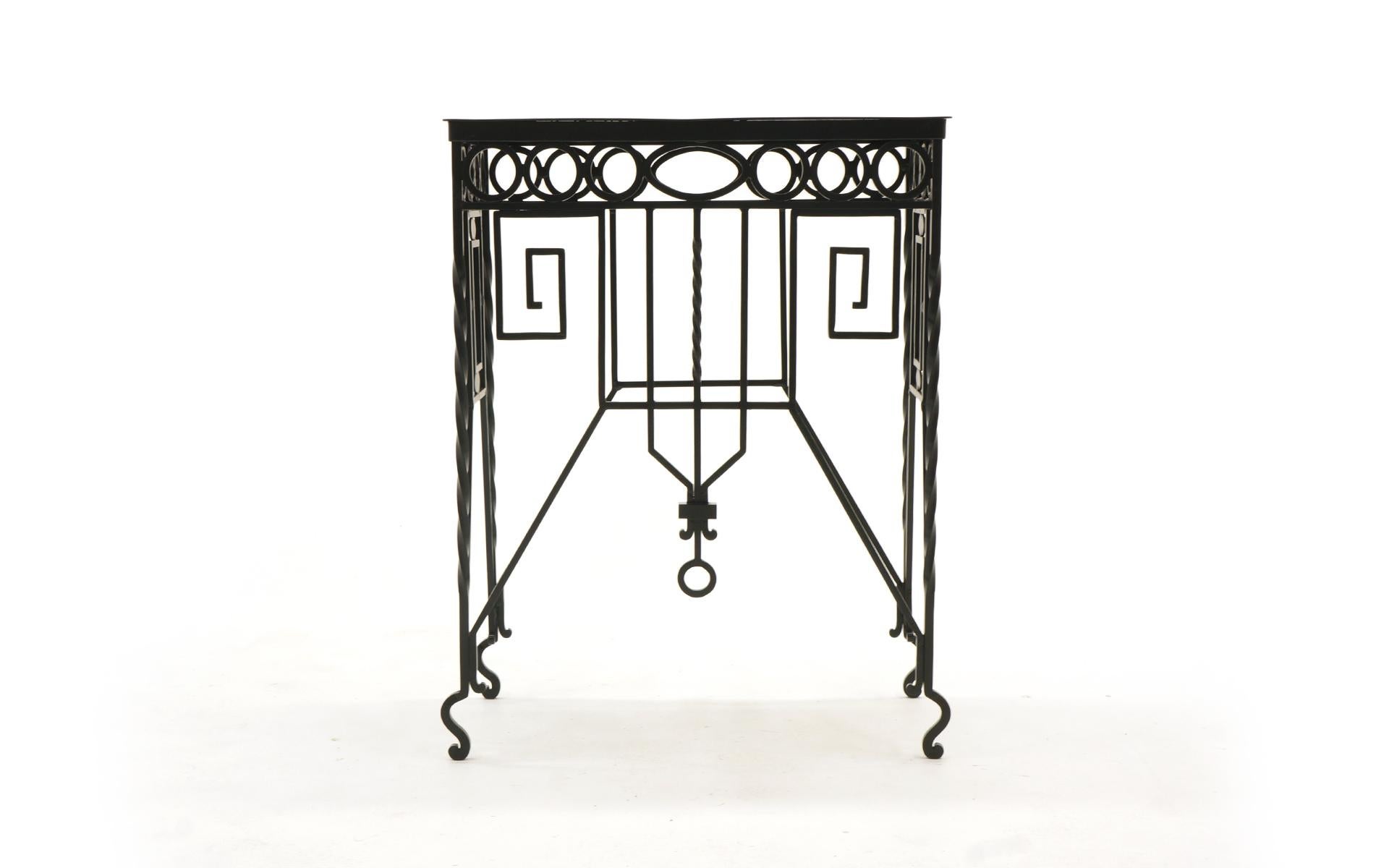 Beautifully crafted Mission / Arts & Crafts wrought iron table. About 33 inches tall. Can be used indoors or outdoors. We have had it expertly media blasted and powder coated in a satin black finish.