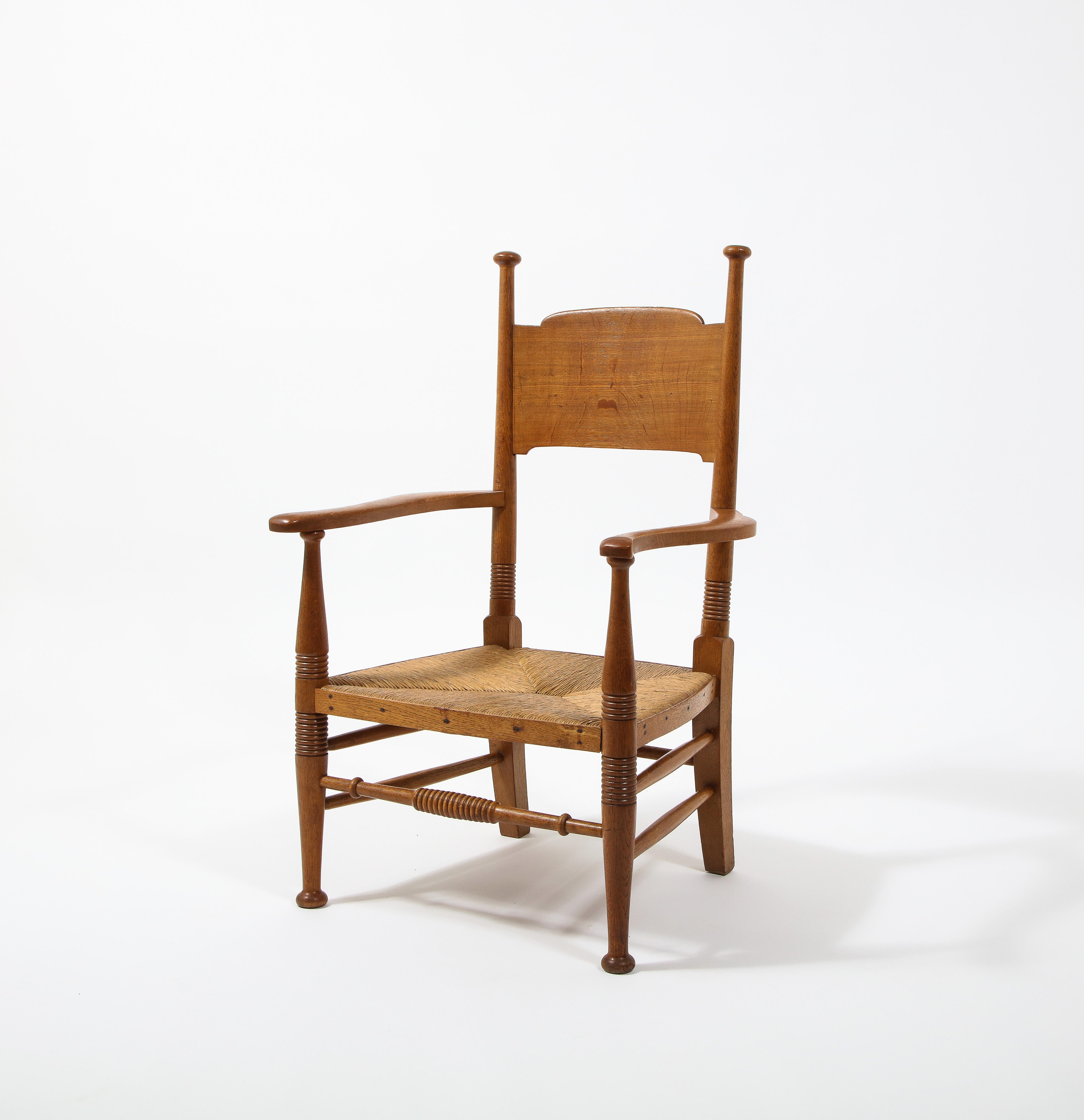 Arts and Crafts  EG Punnets & Williams Arts & Craft Chair with Rush Seat, England 1910's For Sale