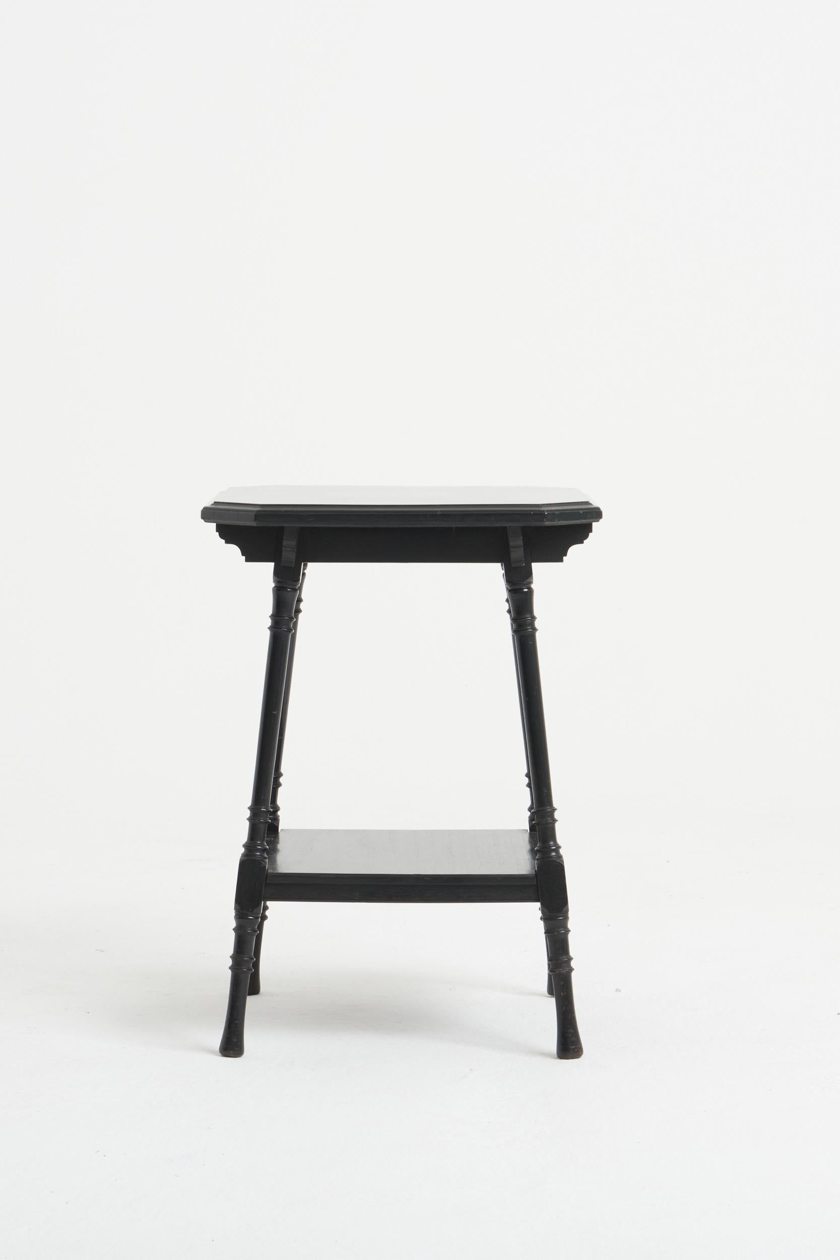 An Arts & Craft ebonized side table. Country house condition. 
England, circa 1910.