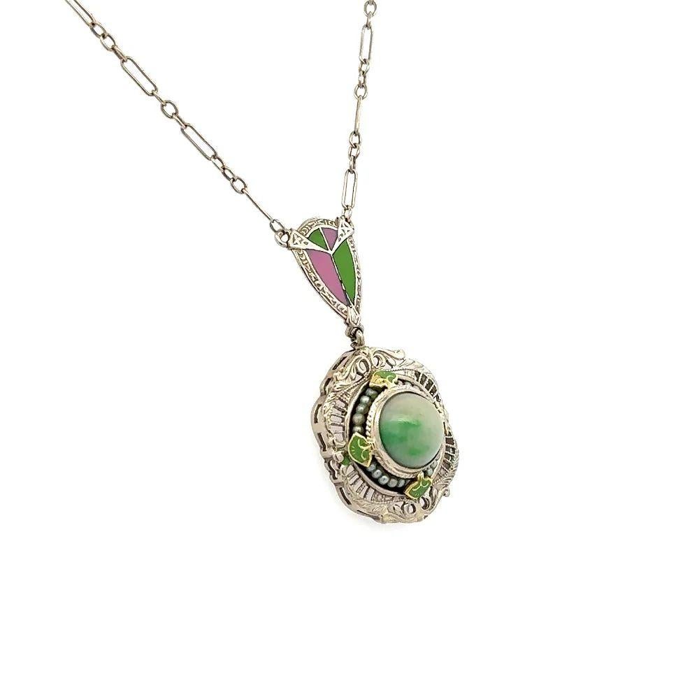 Simply Beautiful! Arts & Crafts Jade, Seed Pearl and Enamel Gold Drop Necklace. Centering a securely Hand set Jade, weighing approx. 1.8 Carat. Enhanced with Seed Pearls and Enamel. Hand crafted in 14K White Gold. Suspended from a 16