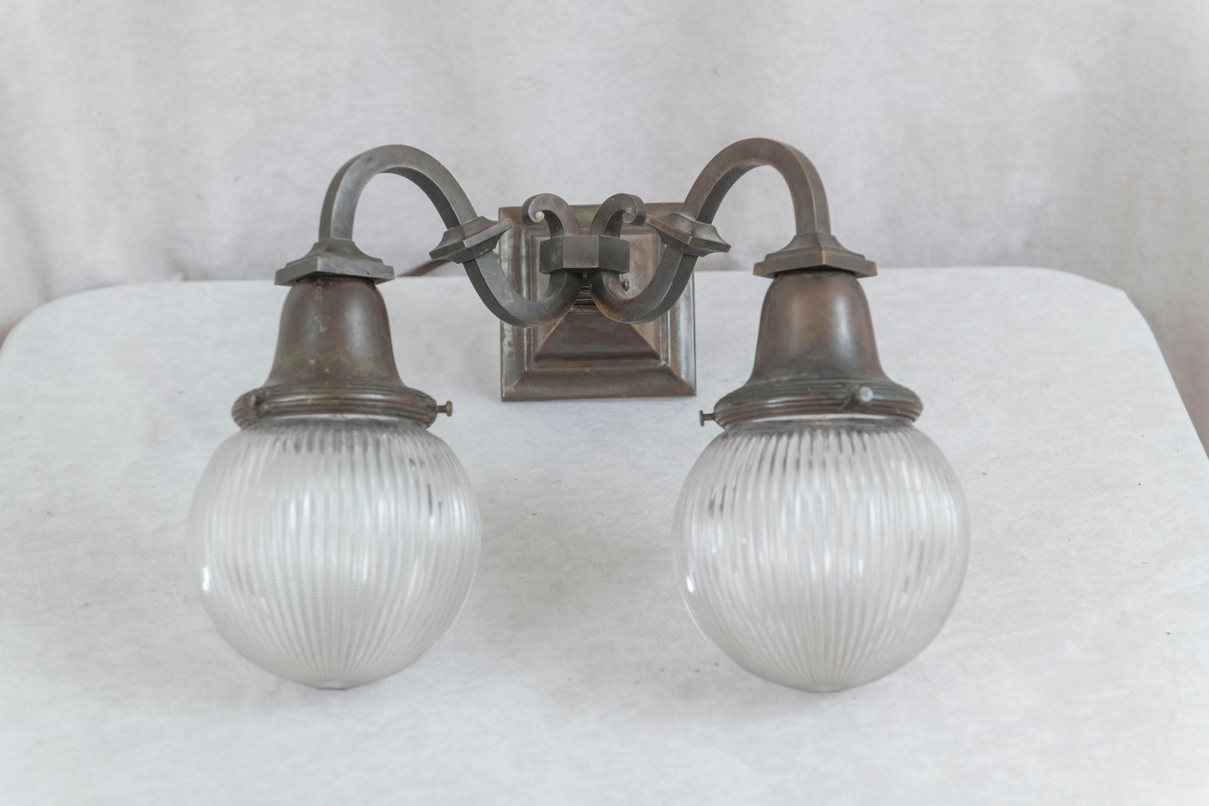 Arts and Crafts Arts & Crafts 2 Arm Bronze Sconce w/Holophane Co. Style Glass Shades, ca. 1910 For Sale