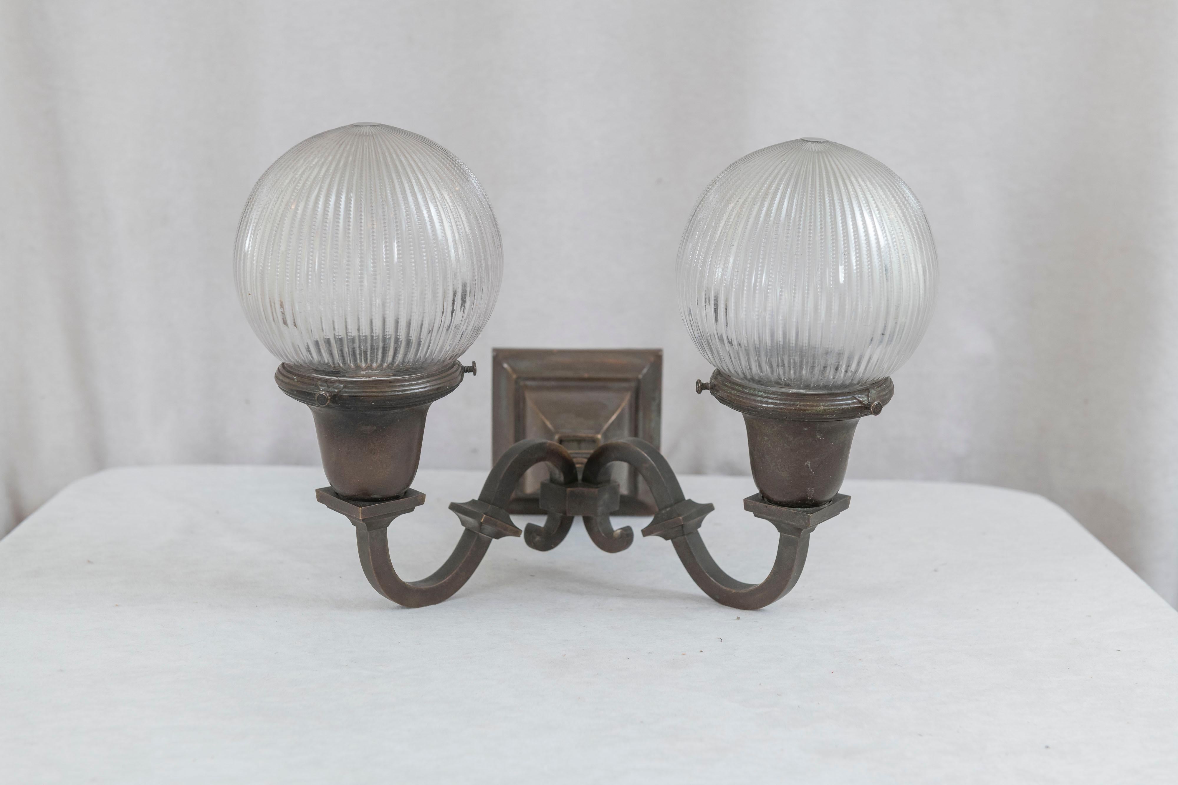 20th Century Arts & Crafts 2 Arm Bronze Sconce w/Holophane Co. Style Glass Shades, ca. 1910 For Sale