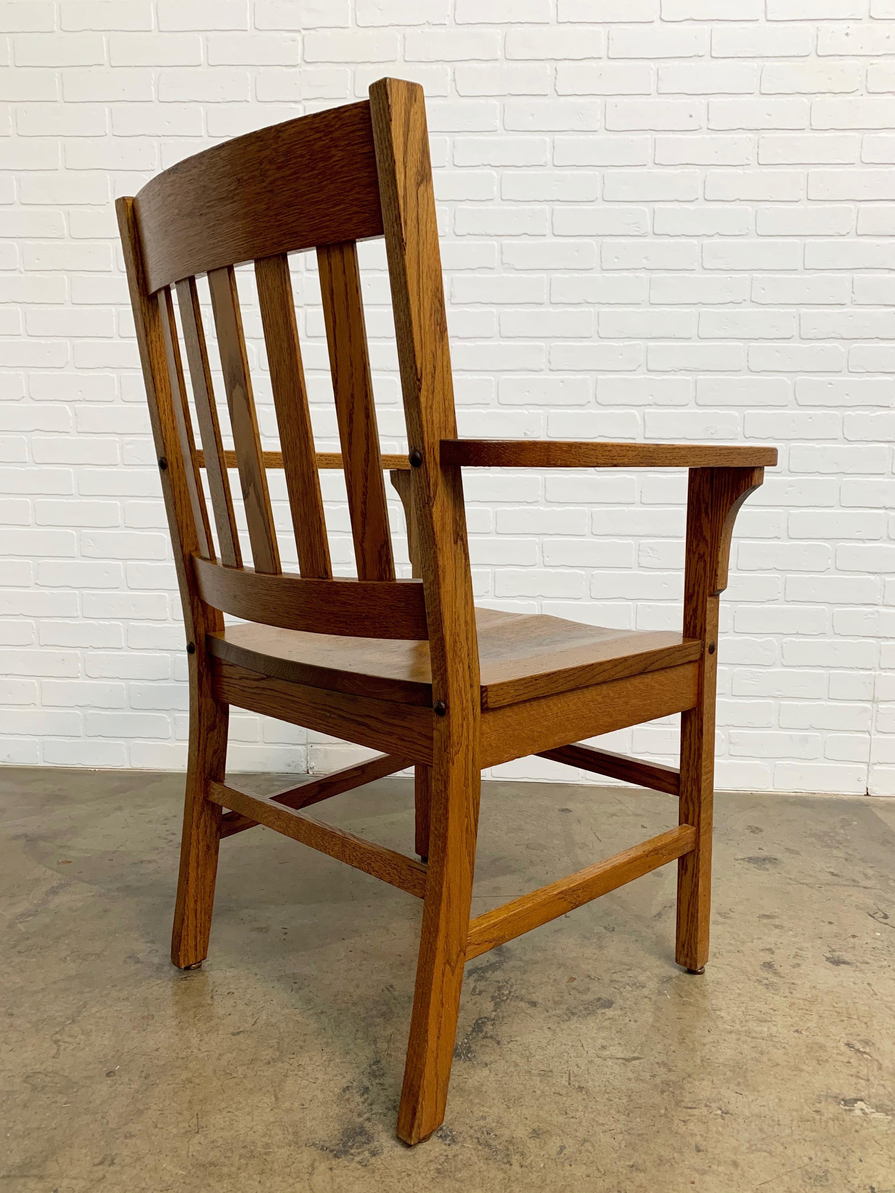 Solid oak Mission style arm / desk chair.