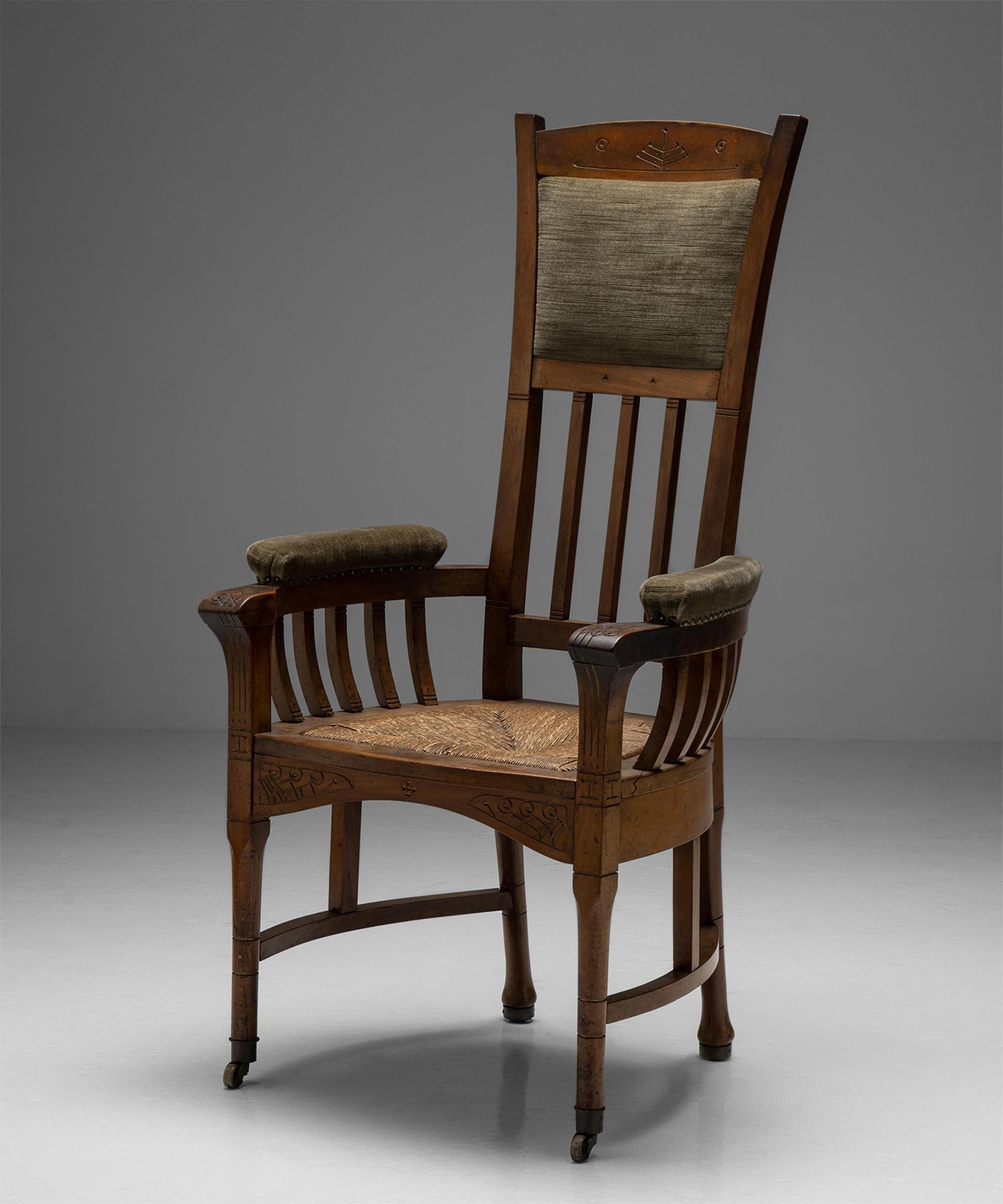 Arts & Crafts armchair no.1

France Circa 1900

Museum quality carved wooden chair with rush seat, and upholstered head and arm rests.

Measures: 24.5