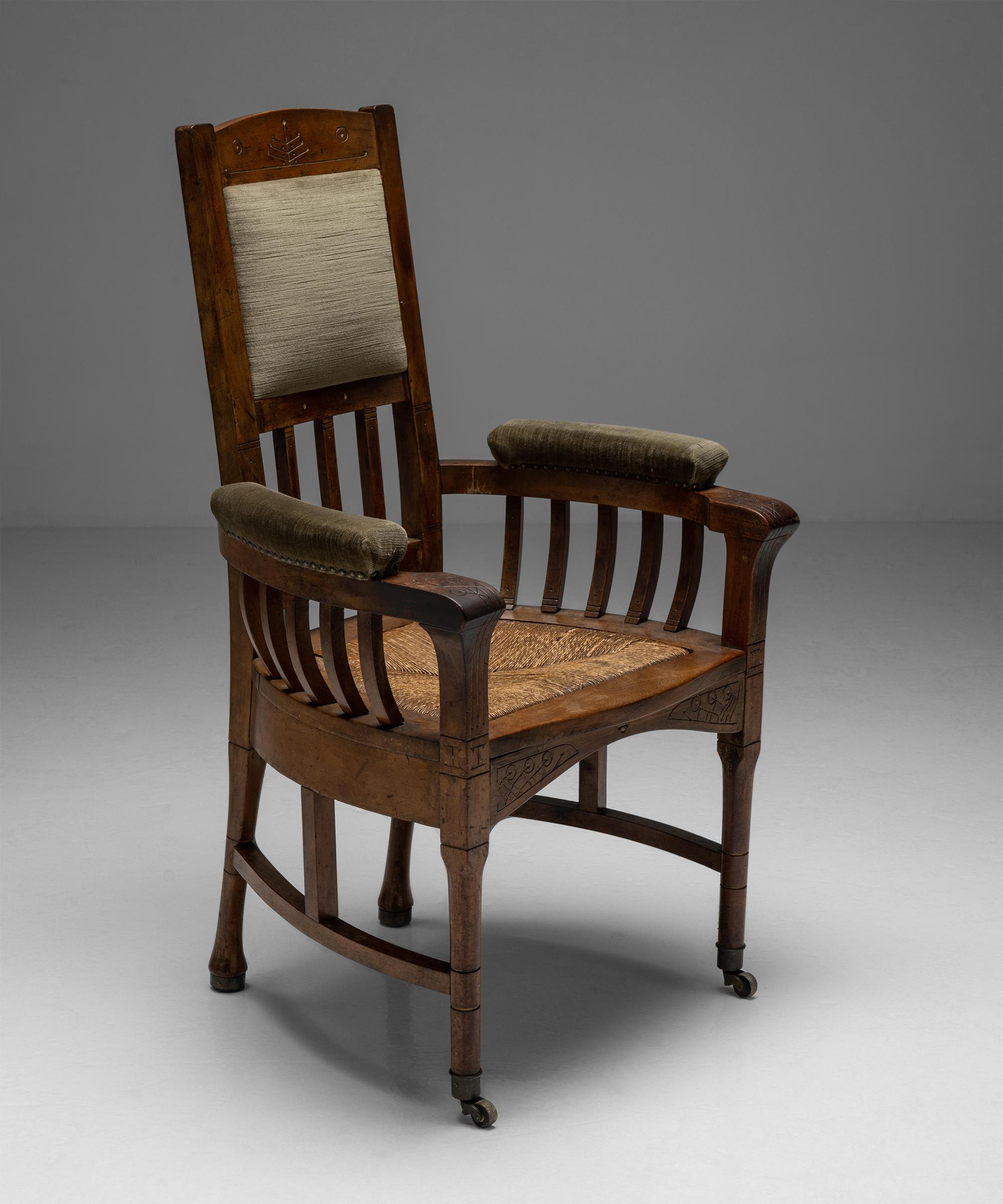 Arts & Crafts armchair no.2

France Circa 1900

Museum quality carved wooden chair with rush seat, and upholstered head and arm rests.

Measures: 26” W x 20”D x 40”H x 19.5”seat.